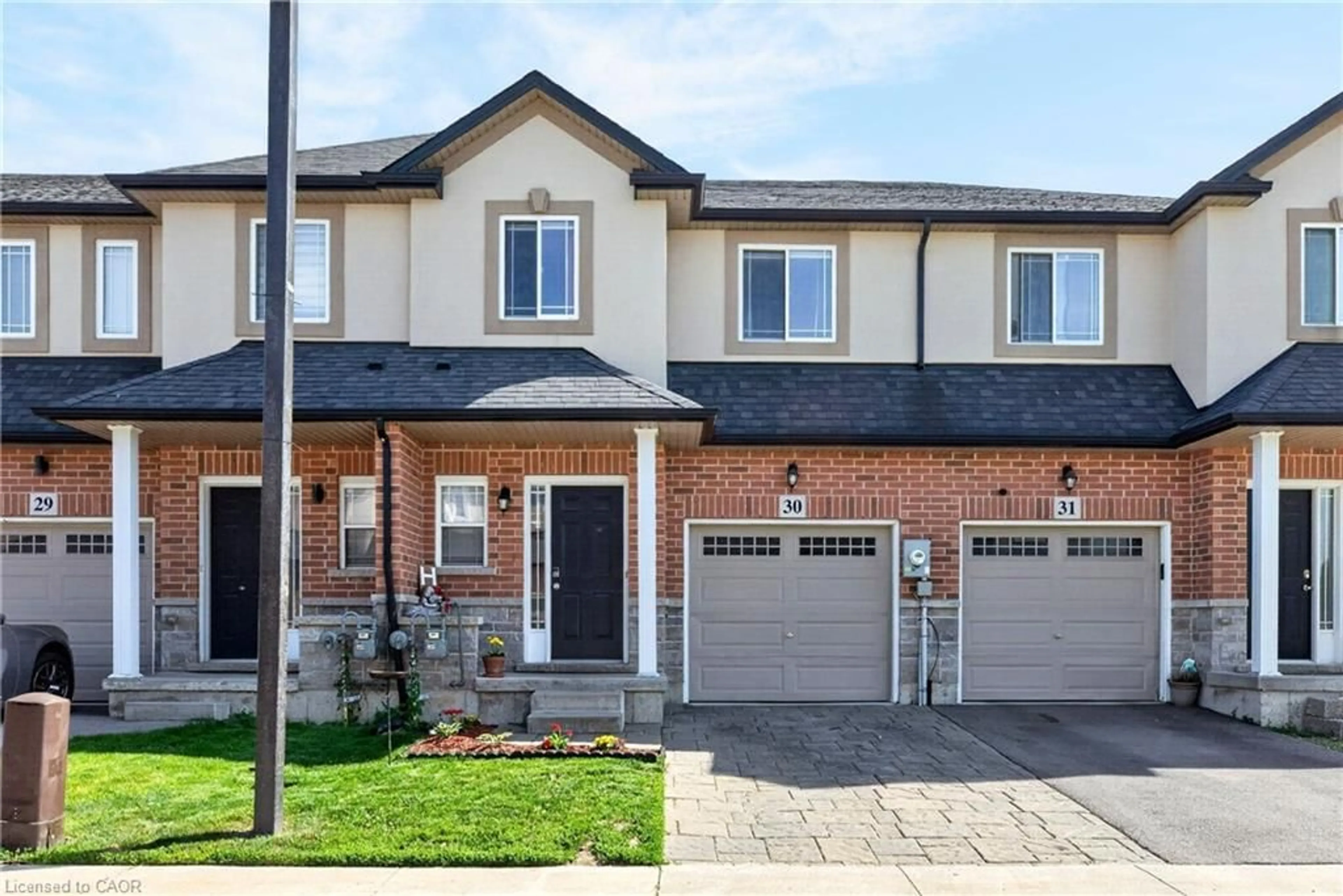 Home with brick exterior material, street for 9 Hampton Brook Way #30, Mount Hope Ontario L0R 1W0