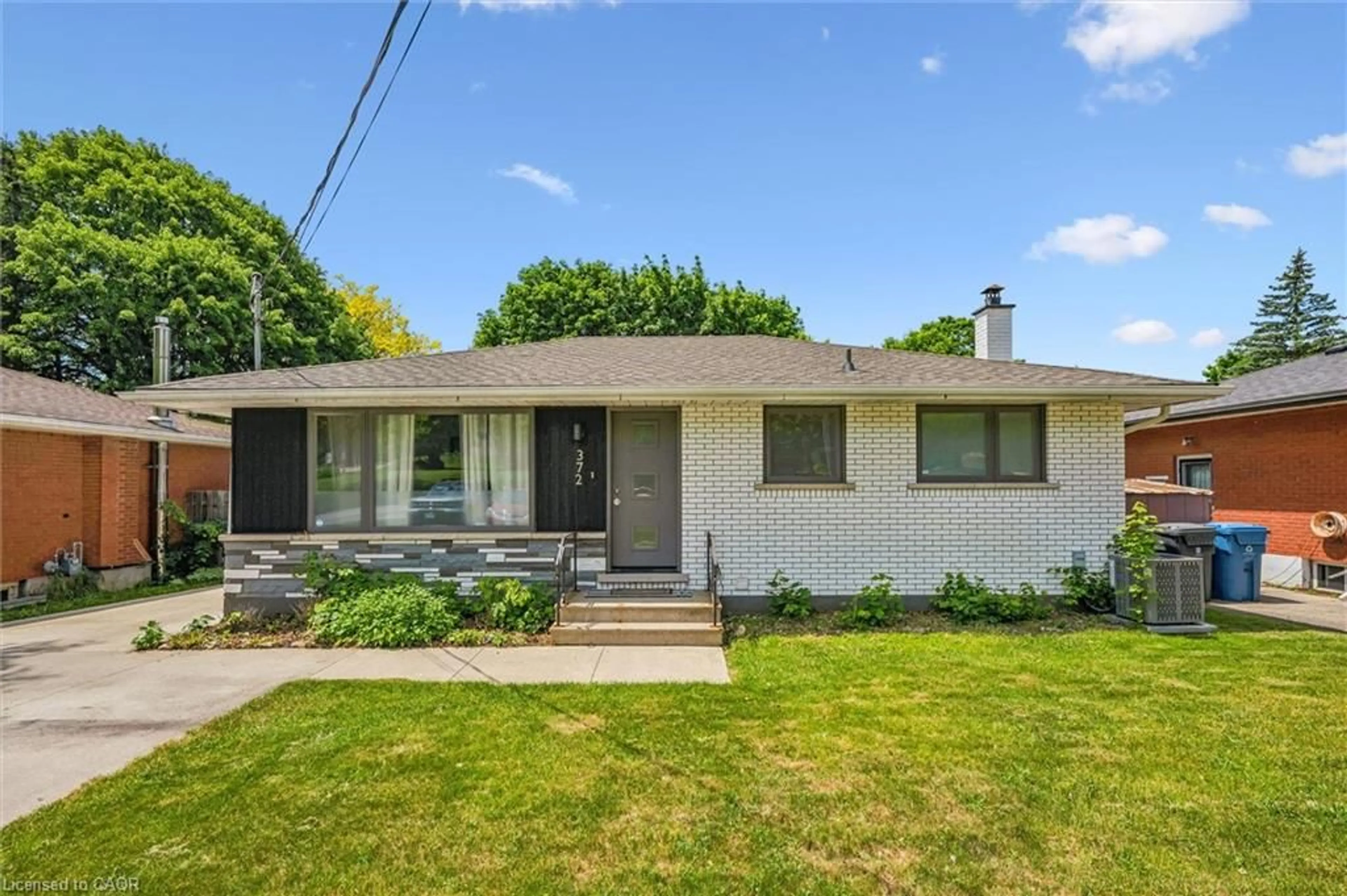 Home with vinyl exterior material, street for 372 Victoria Rd, Guelph Ontario N1E 5J7