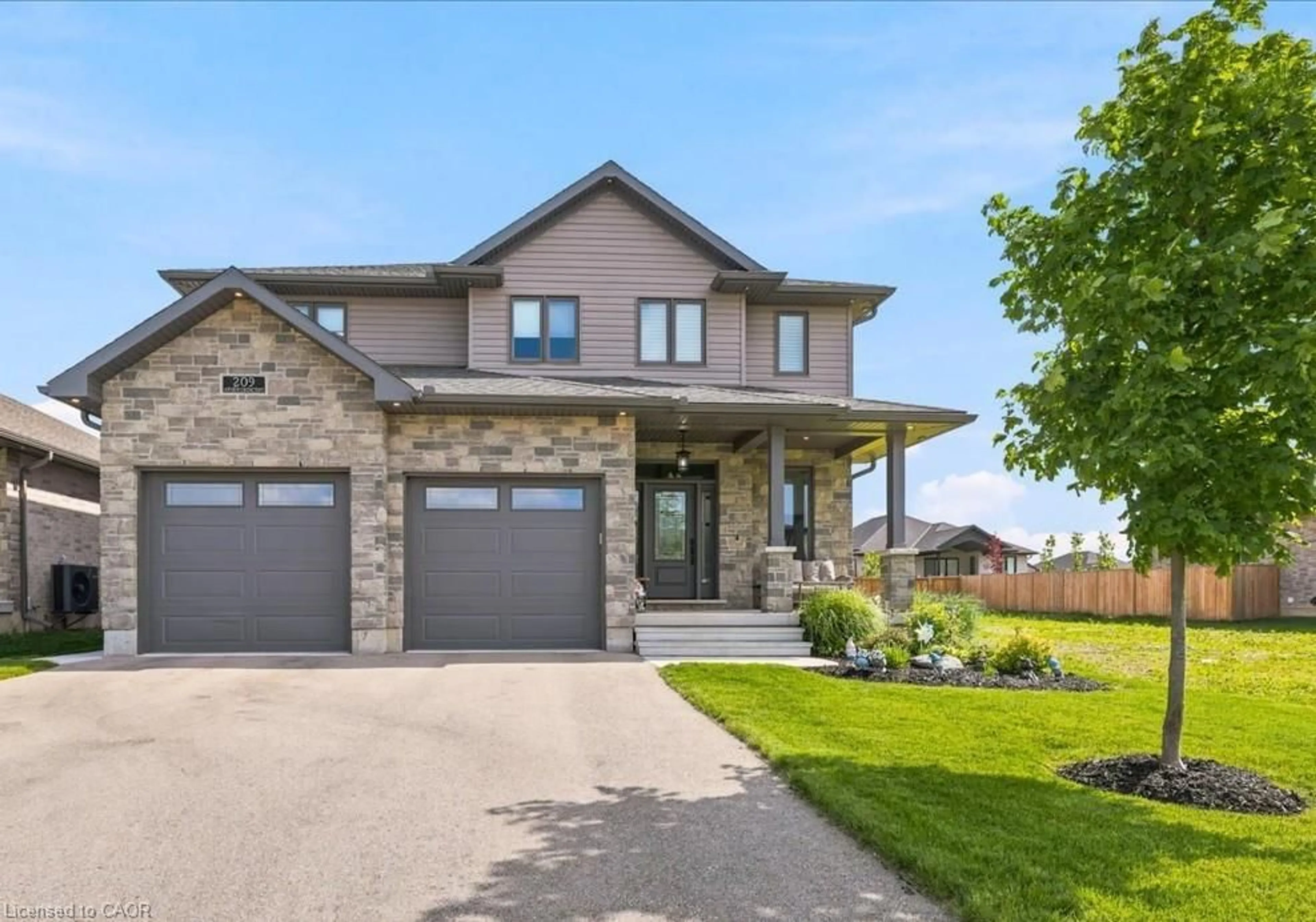 Home with brick exterior material, street for 209 Arden Cres, Mitchell Ontario N0K 1N0
