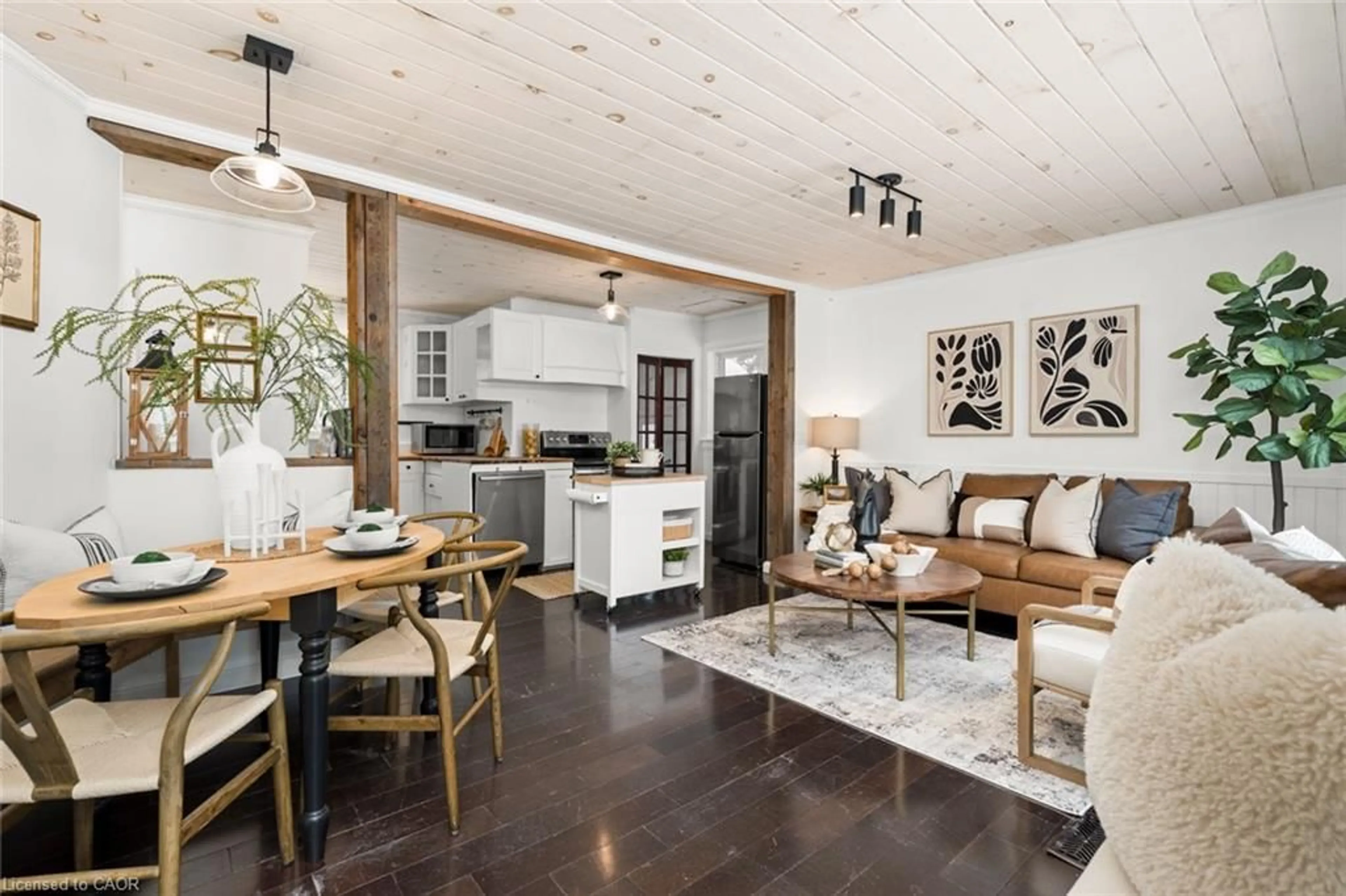 Open concept kitchen, wood/laminate floor for 469 Rowanwood Rd, Huntsville Ontario P0B 1M0