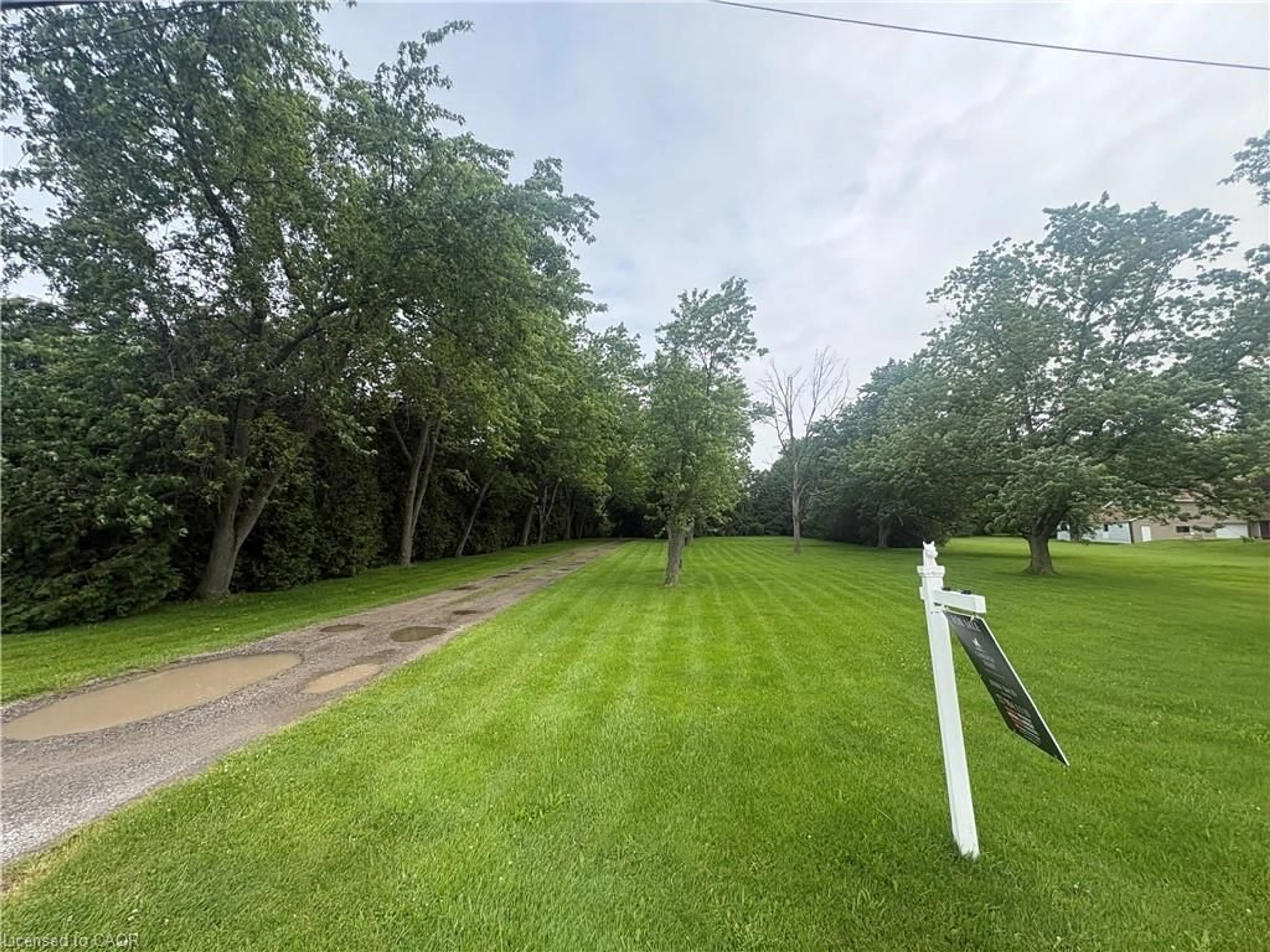 A pic from outside/outdoor area/front of a property/back of a property/a pic from drone, forest/trees view for 165 Ridge Rd, Grimsby Ontario L3M 4E7