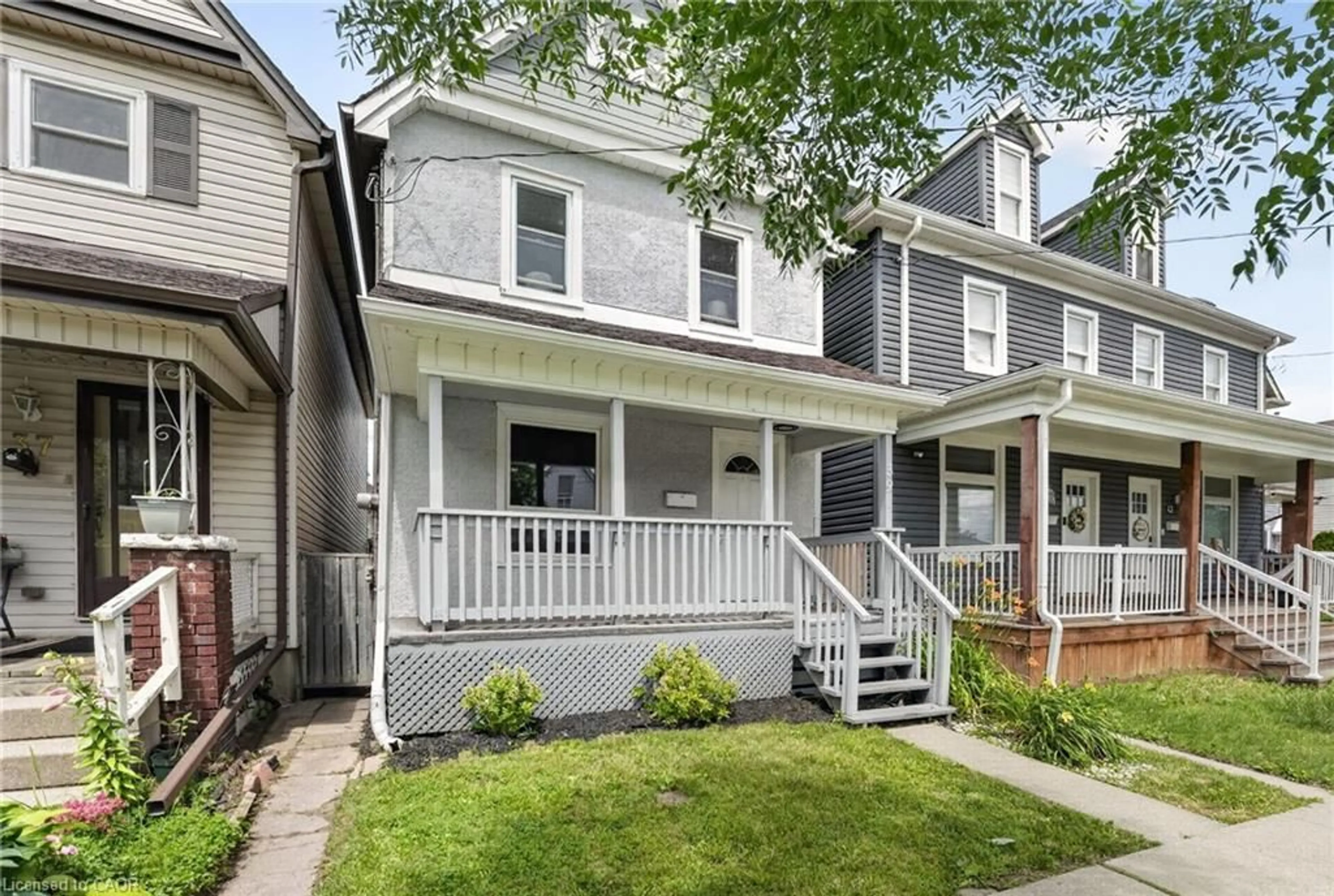 Home with vinyl exterior material, street for 39 Beechwood Ave, Hamilton Ontario L8L 2S5