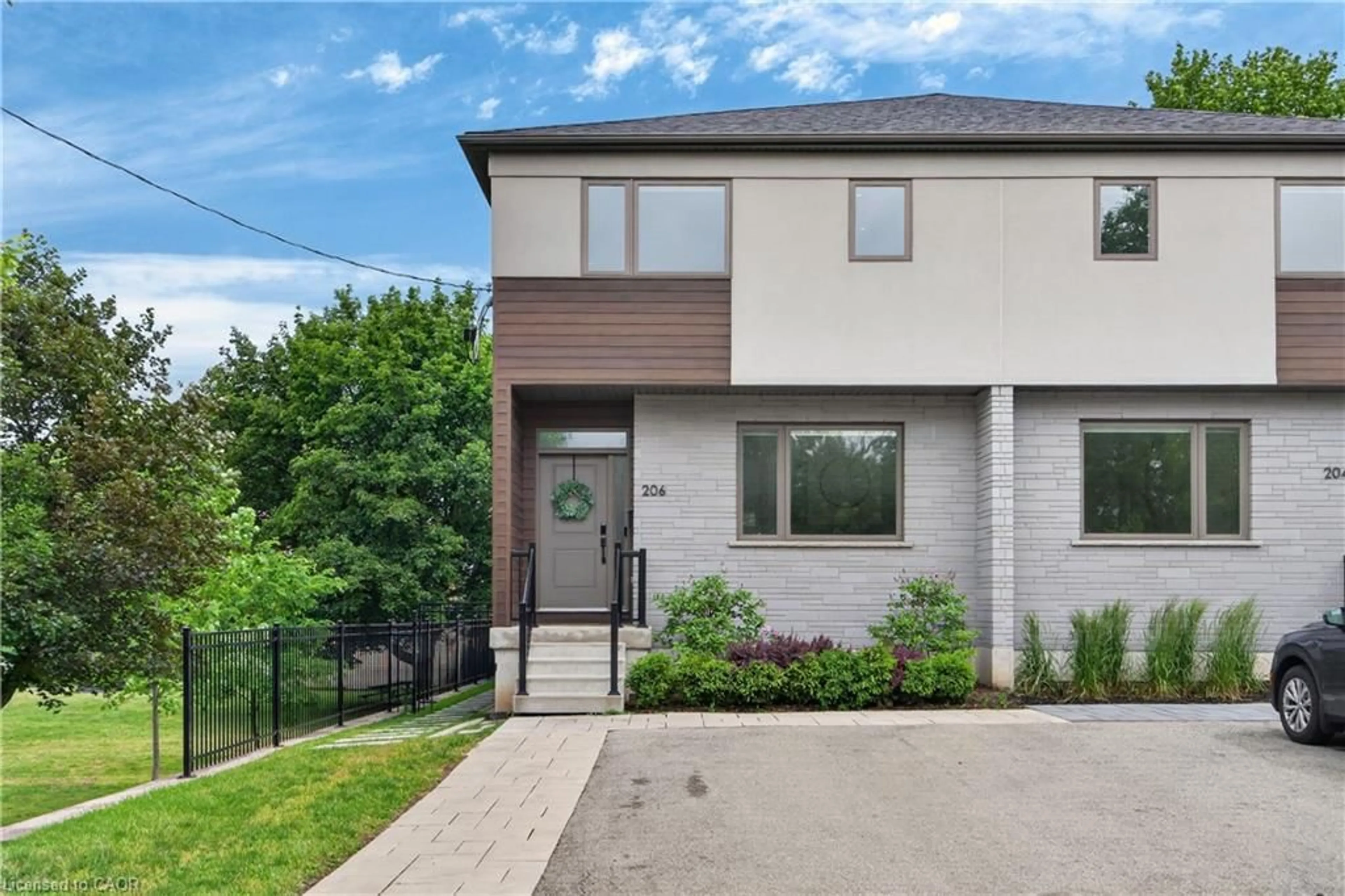 Home with brick exterior material, street for 206 Canada St, Hamilton Ontario L8P 1P6