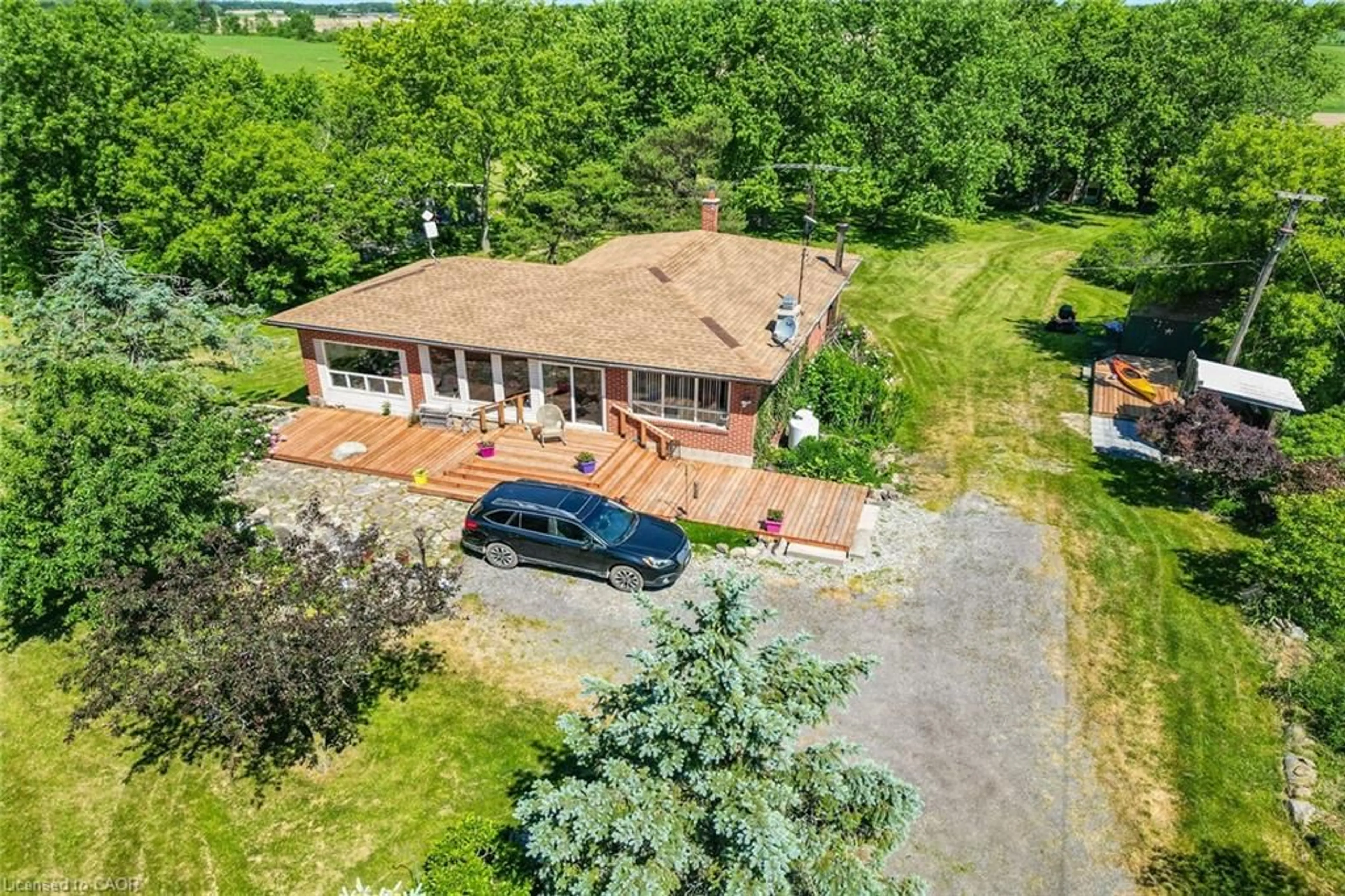 A pic from outside/outdoor area/front of a property/back of a property/a pic from drone, unknown for 1225 Indiana Rd, Canfield Ontario N0A 1C0