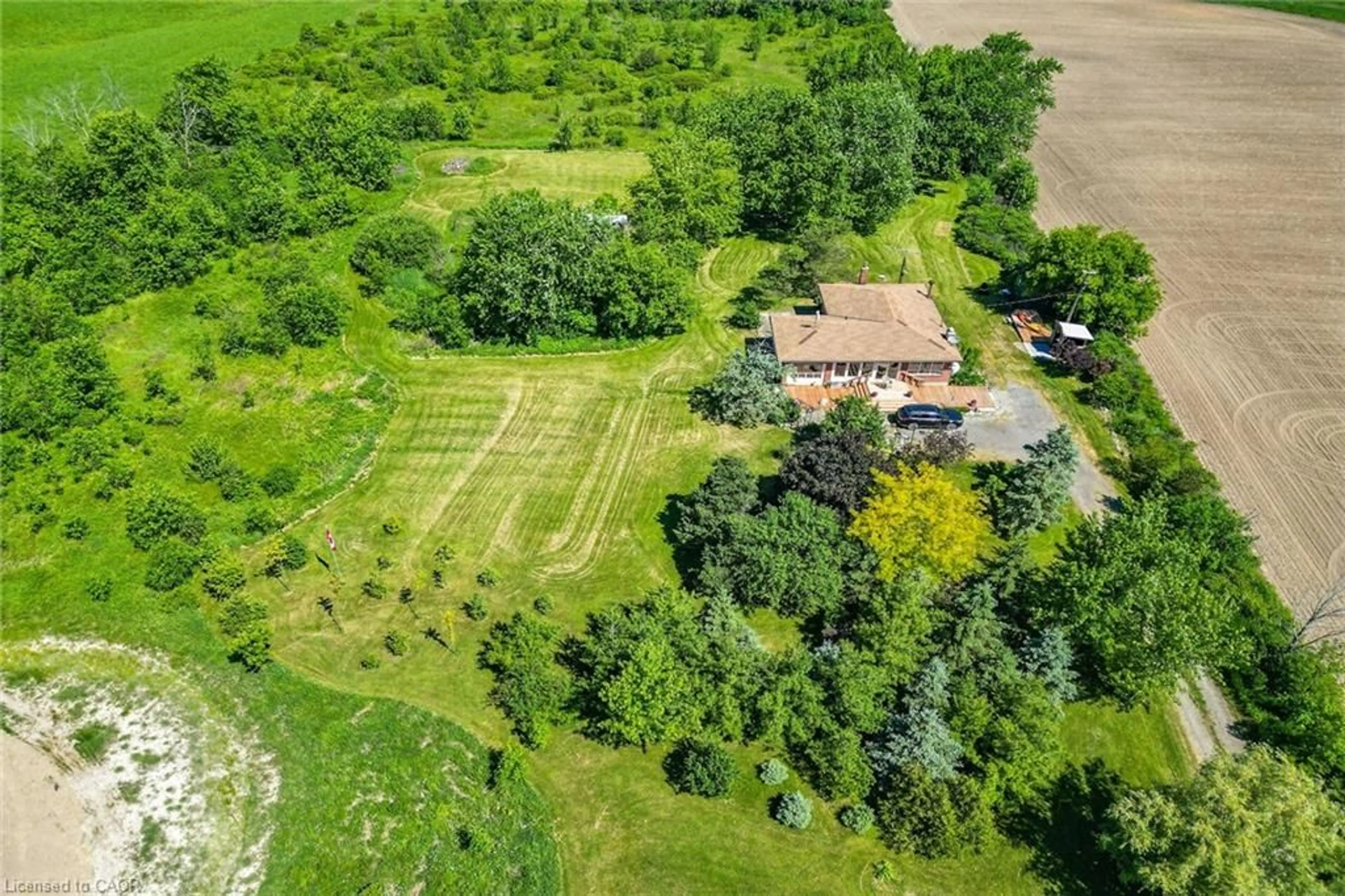 A pic from outside/outdoor area/front of a property/back of a property/a pic from drone, unknown for 1225 Indiana Rd, Canfield Ontario N0A 1C0