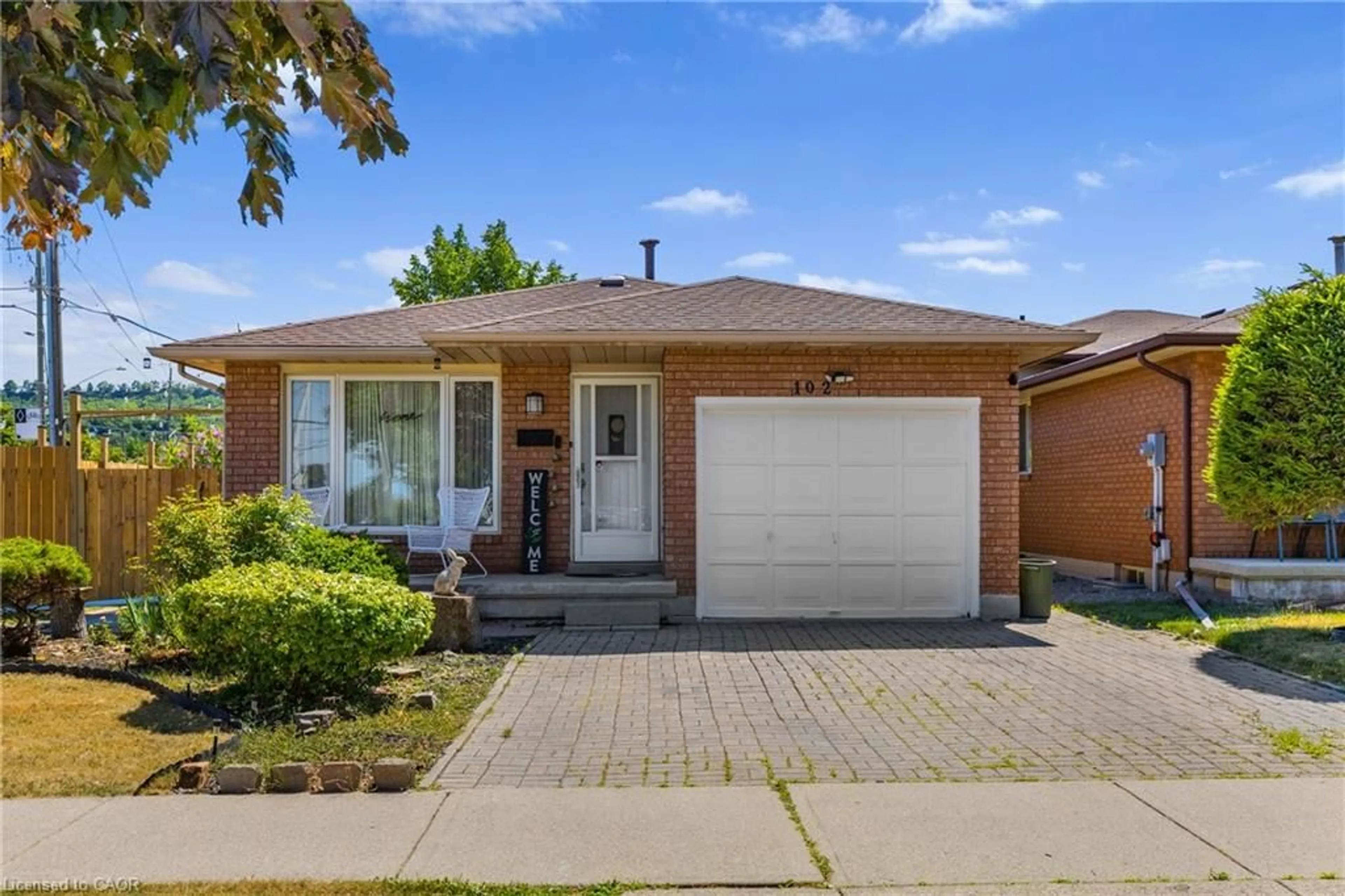 Home with brick exterior material, street for 102 Juniper Dr, Hamilton Ontario L8E 4G6