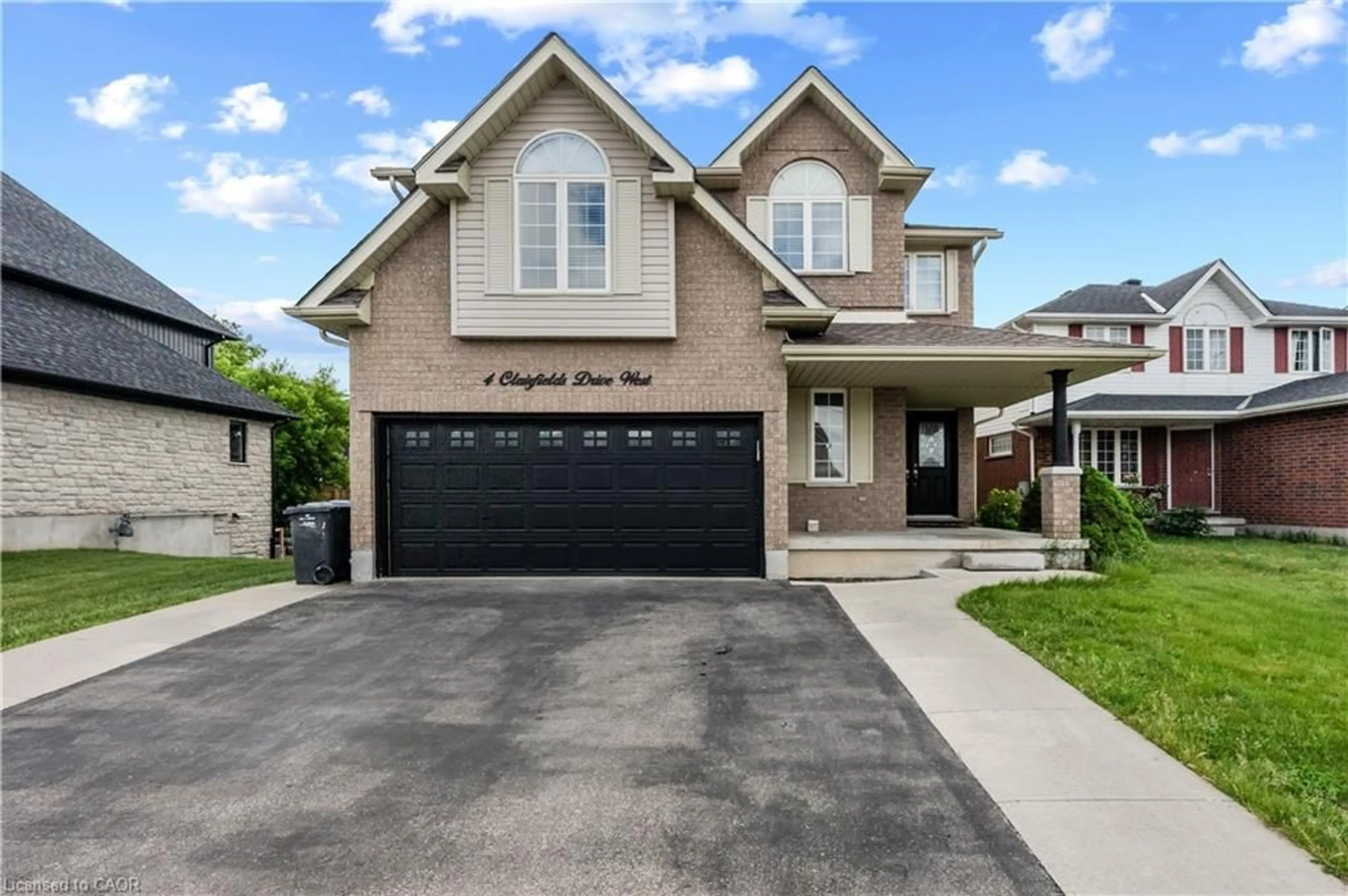 Home with brick exterior material, street for 4 Clairfields Dr, Guelph Ontario N1G 5H5