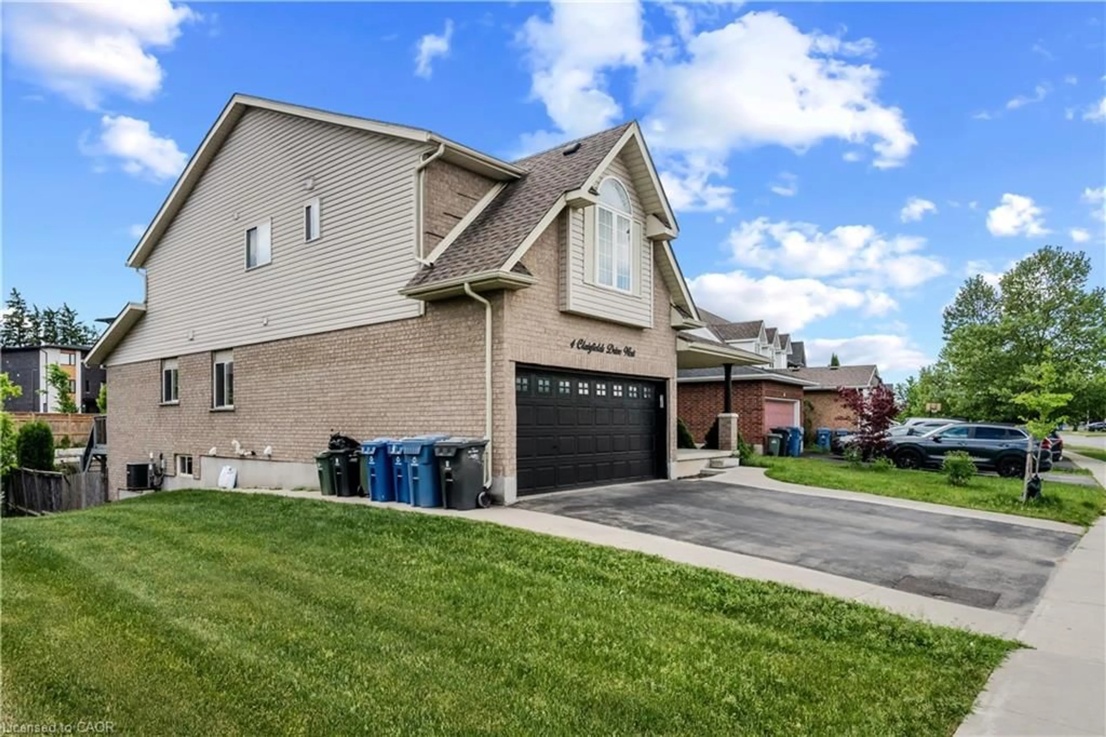 Home with brick exterior material, street for 4 Clairfields Dr, Guelph Ontario N1G 5H5