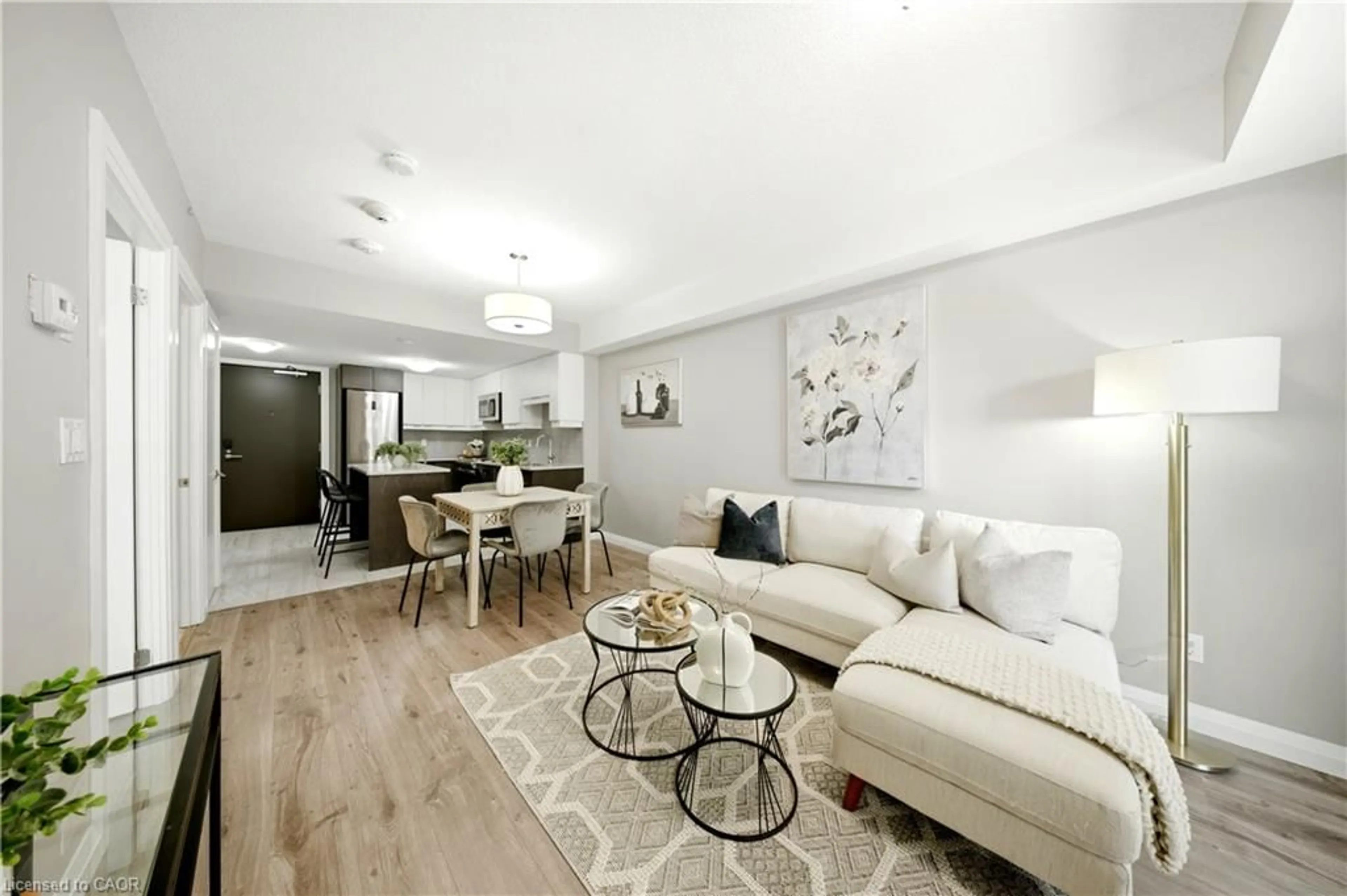 Living room with furniture, unknown for 63 Arthur St #205, Guelph Ontario N1E 0A8