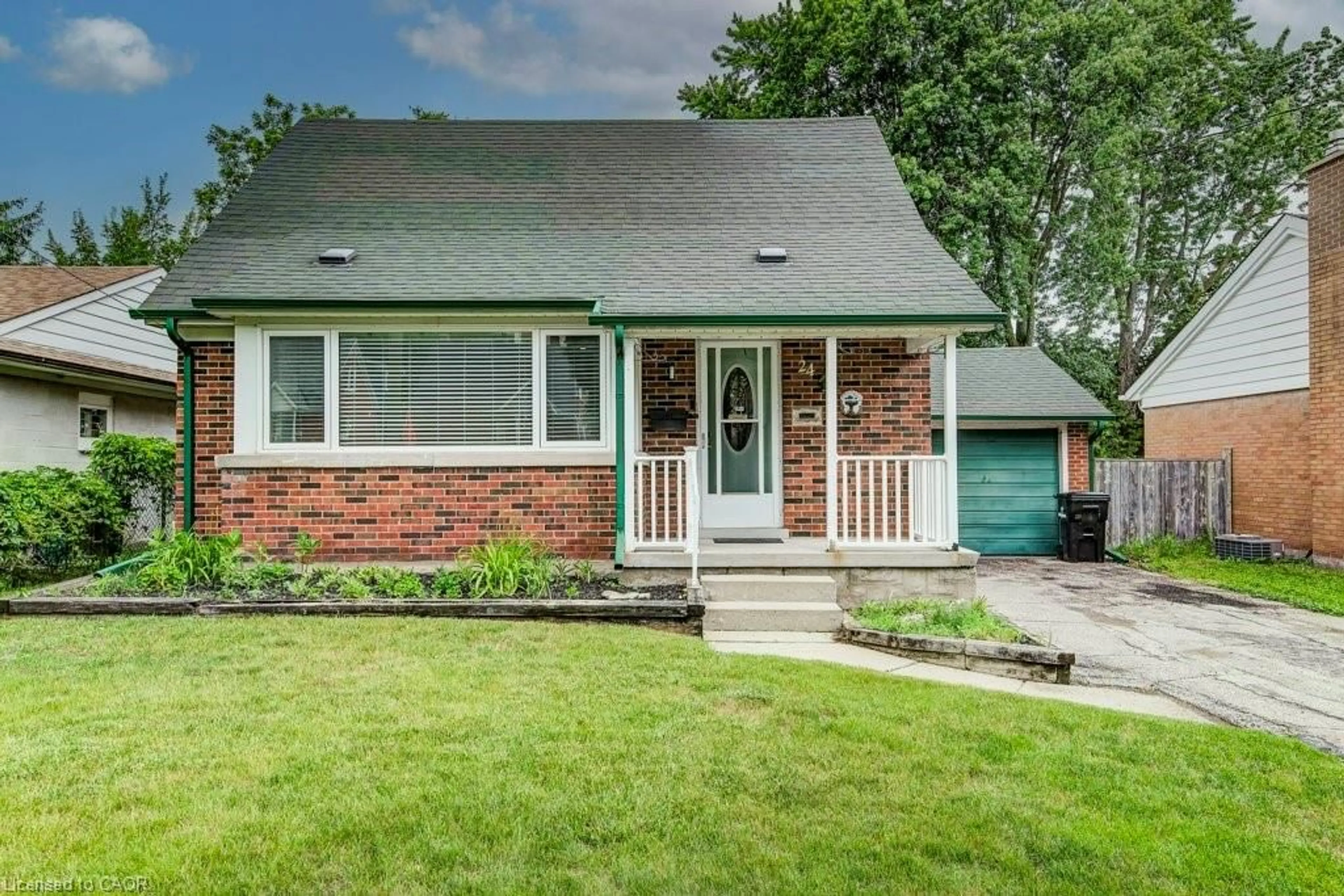 Home with brick exterior material, street for 24 Belmont Ave, Kitchener Ontario N2M 4B9
