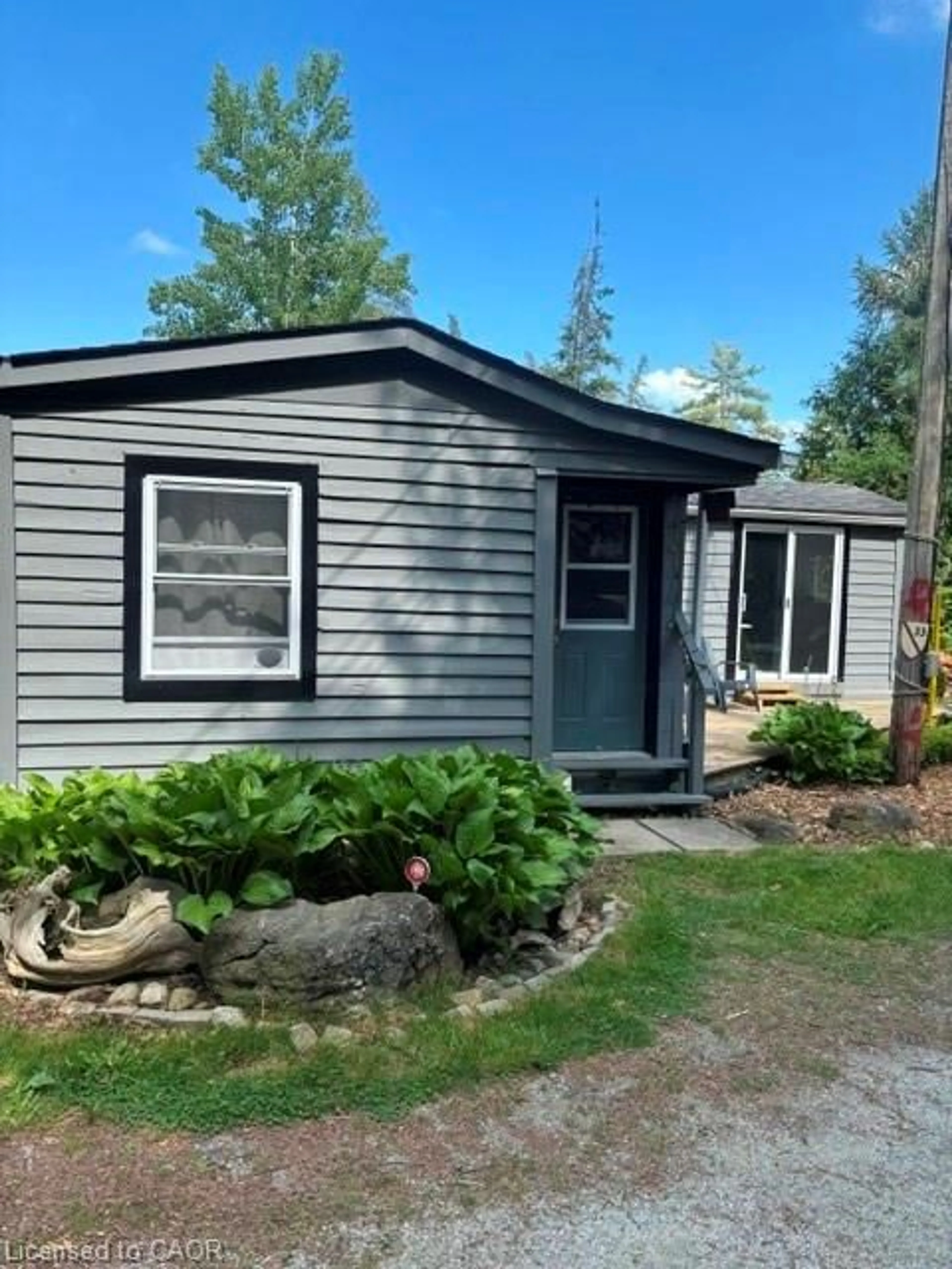 Home with vinyl exterior material, street for 1085 Concession 10 Rd #33, Flamborough Ontario L0R 1K0