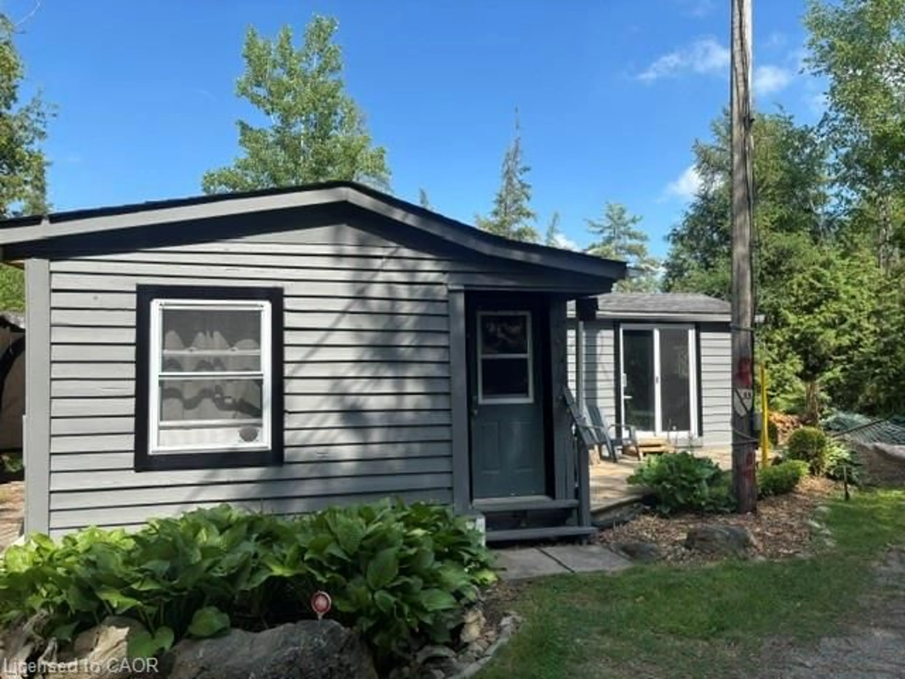 Home with vinyl exterior material, street for 1085 Concession 10 Rd #33, Flamborough Ontario L0R 1K0