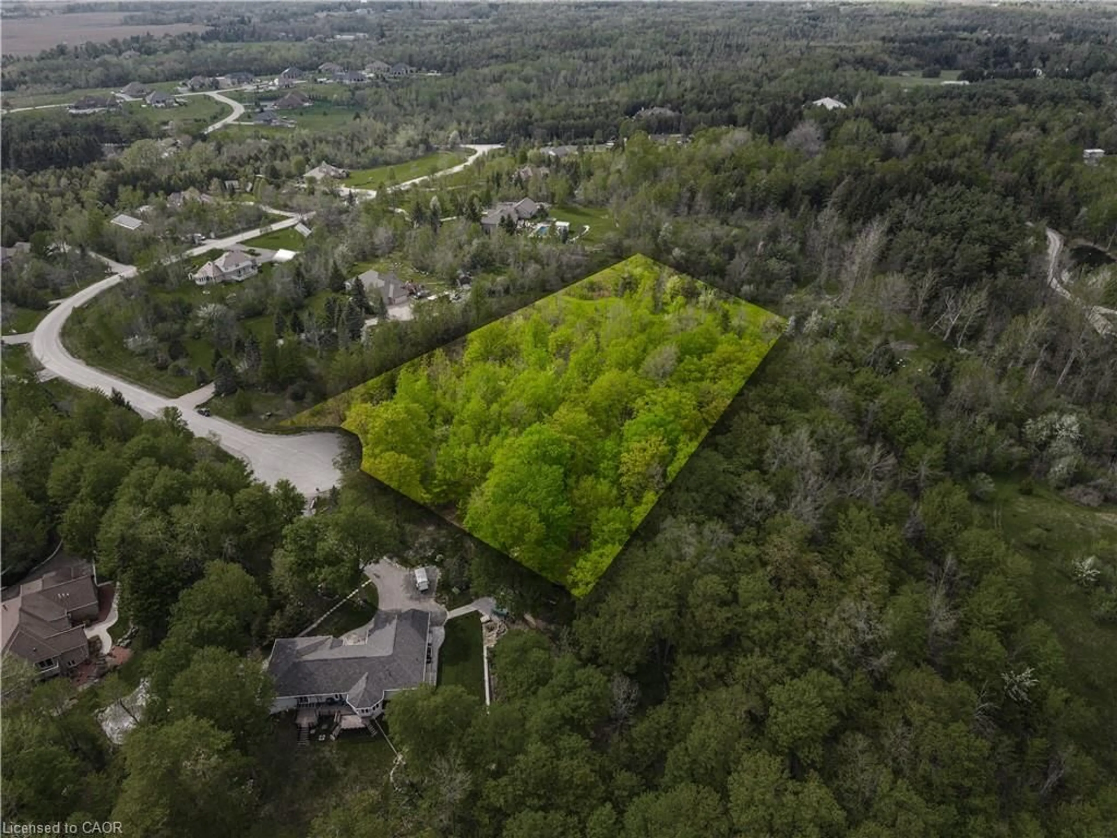 A pic from outside/outdoor area/front of a property/back of a property/a pic from drone, forest/trees view for 15 Morgan Dr, Acton Ontario L7L 2L7