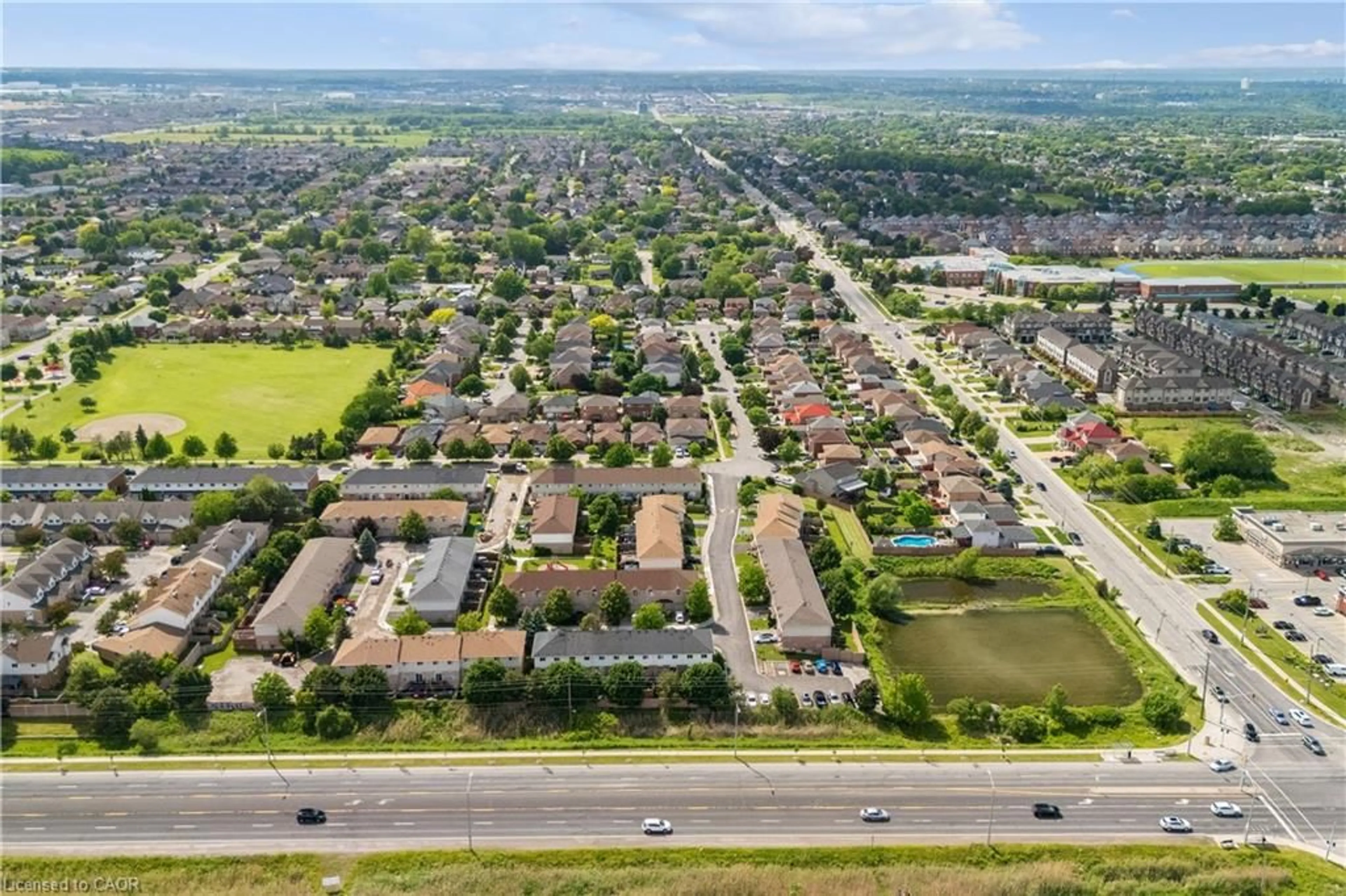 A pic from outside/outdoor area/front of a property/back of a property/a pic from drone, street for 39 Pinewoods Dr #35, Stoney Creek Ontario L8J 3Z4