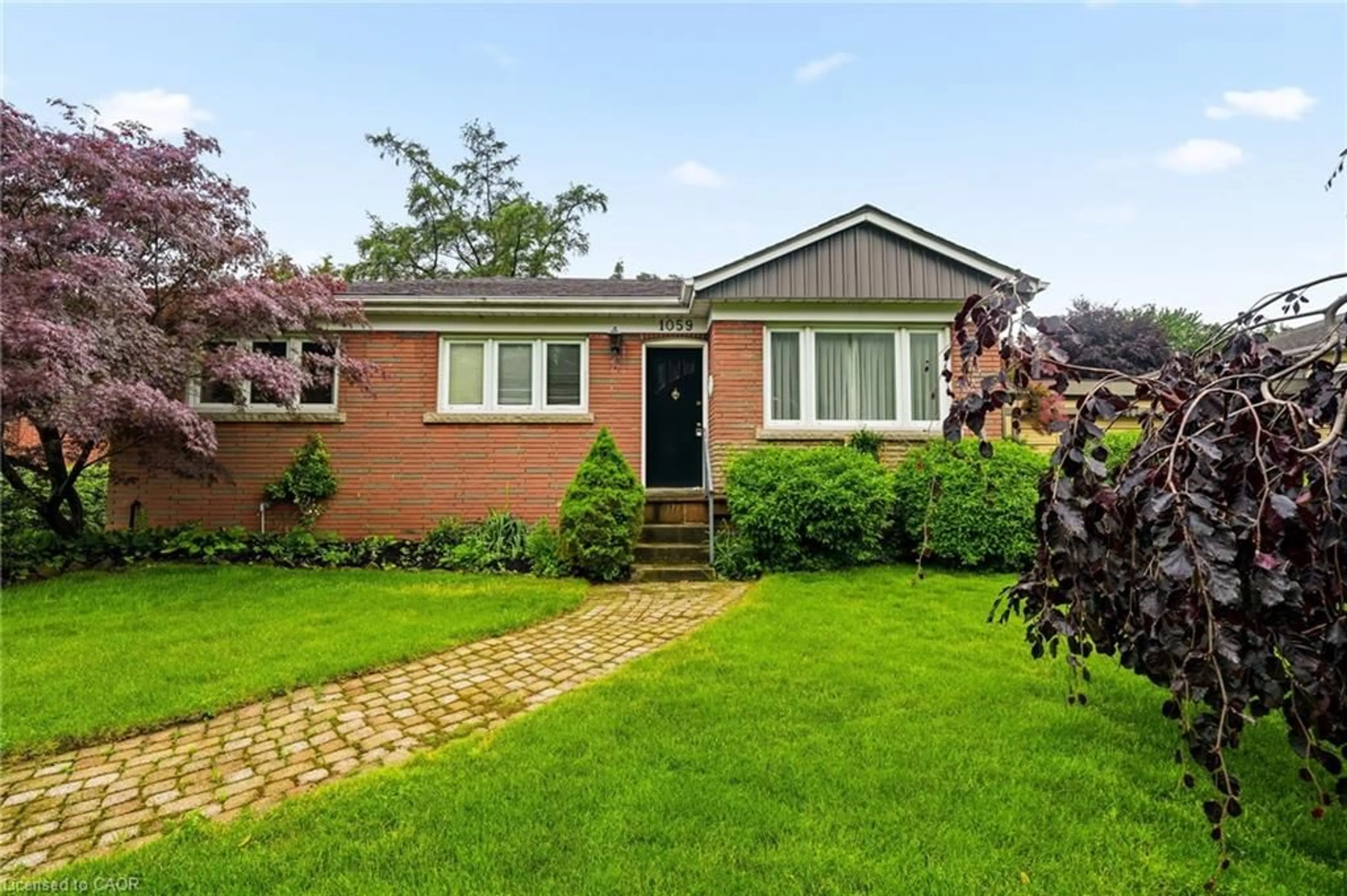 Home with brick exterior material, street for 1059 Shepherds Dr, Burlington Ontario L7T 3R4