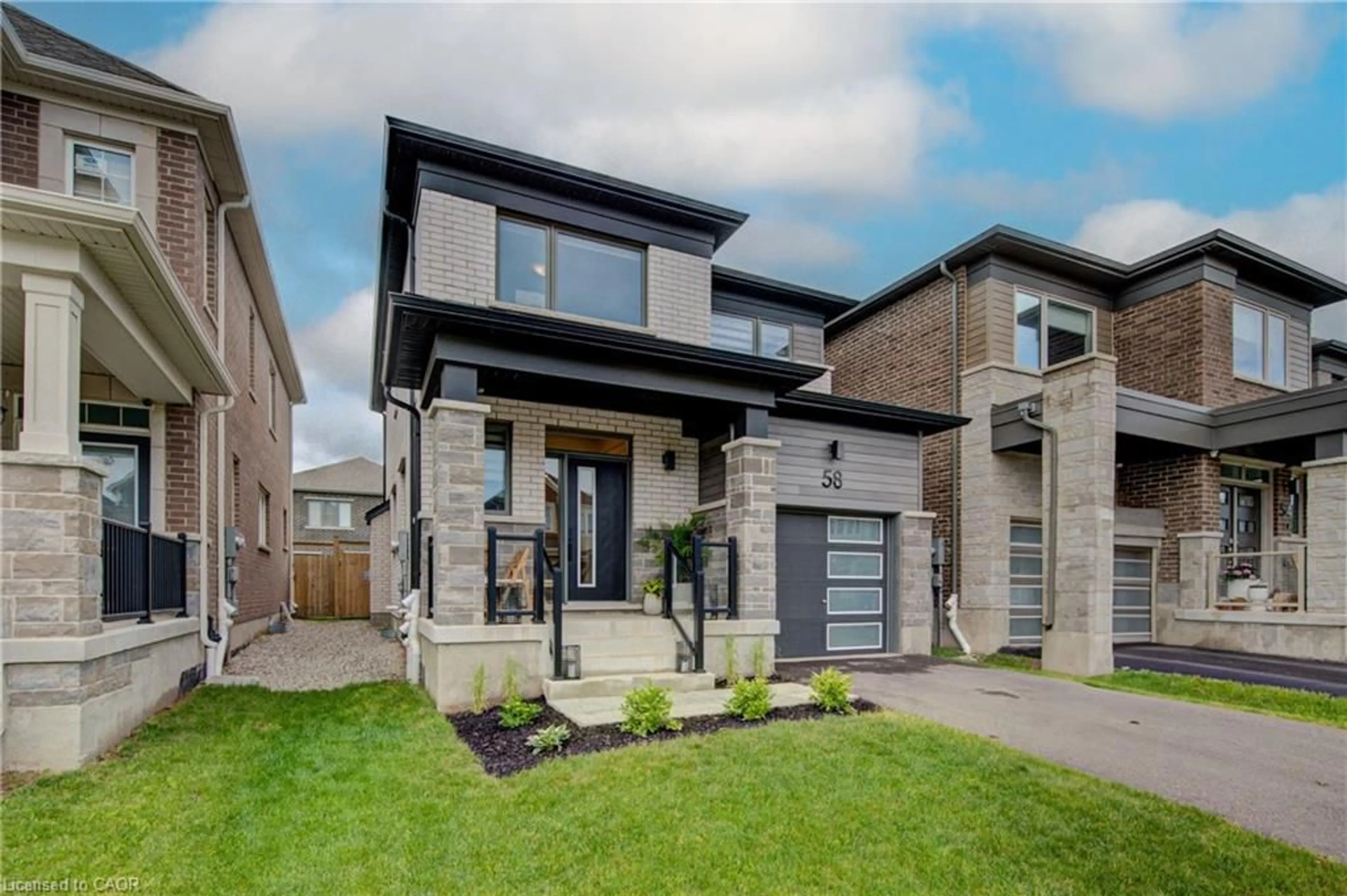 Home with brick exterior material, street for 58 Routley St, Kitchener Ontario N2R 0S2