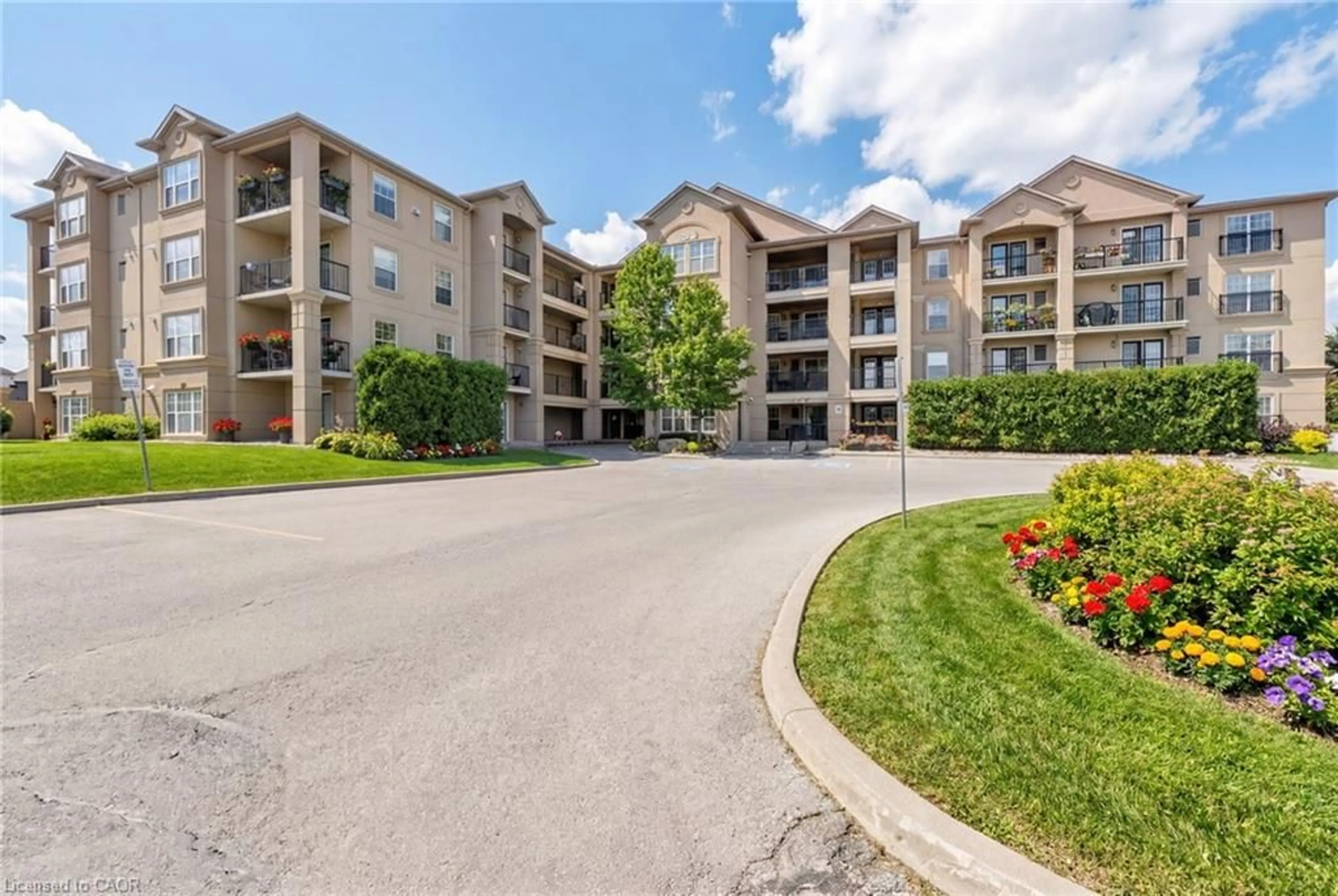 A pic from outside/outdoor area/front of a property/back of a property/a pic from drone, unknown for 1350 Main St #301, Milton Ontario L9T 7S7