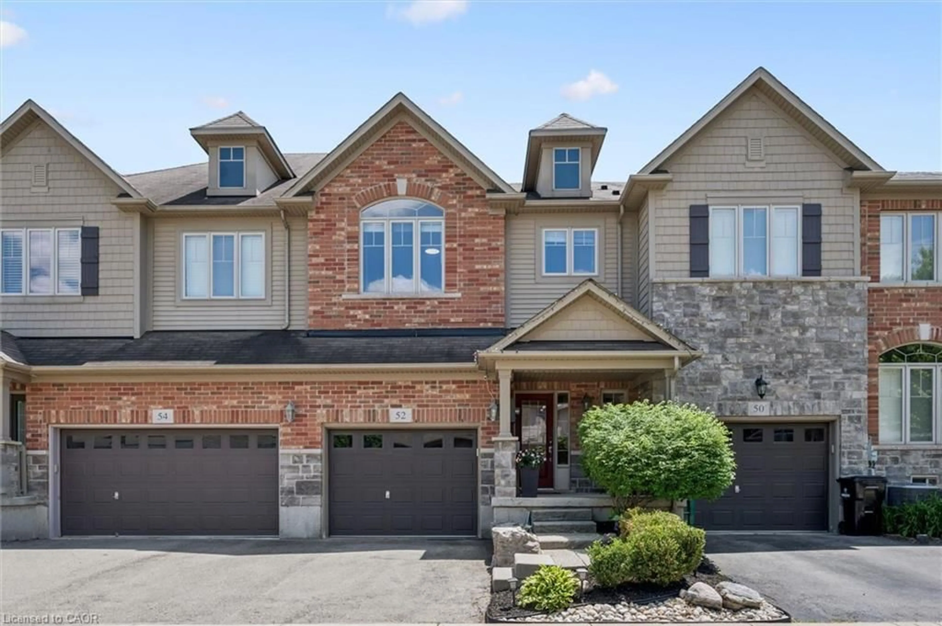 Home with brick exterior material, street for 52 Condor St, Kitchener Ontario N2K 0B2