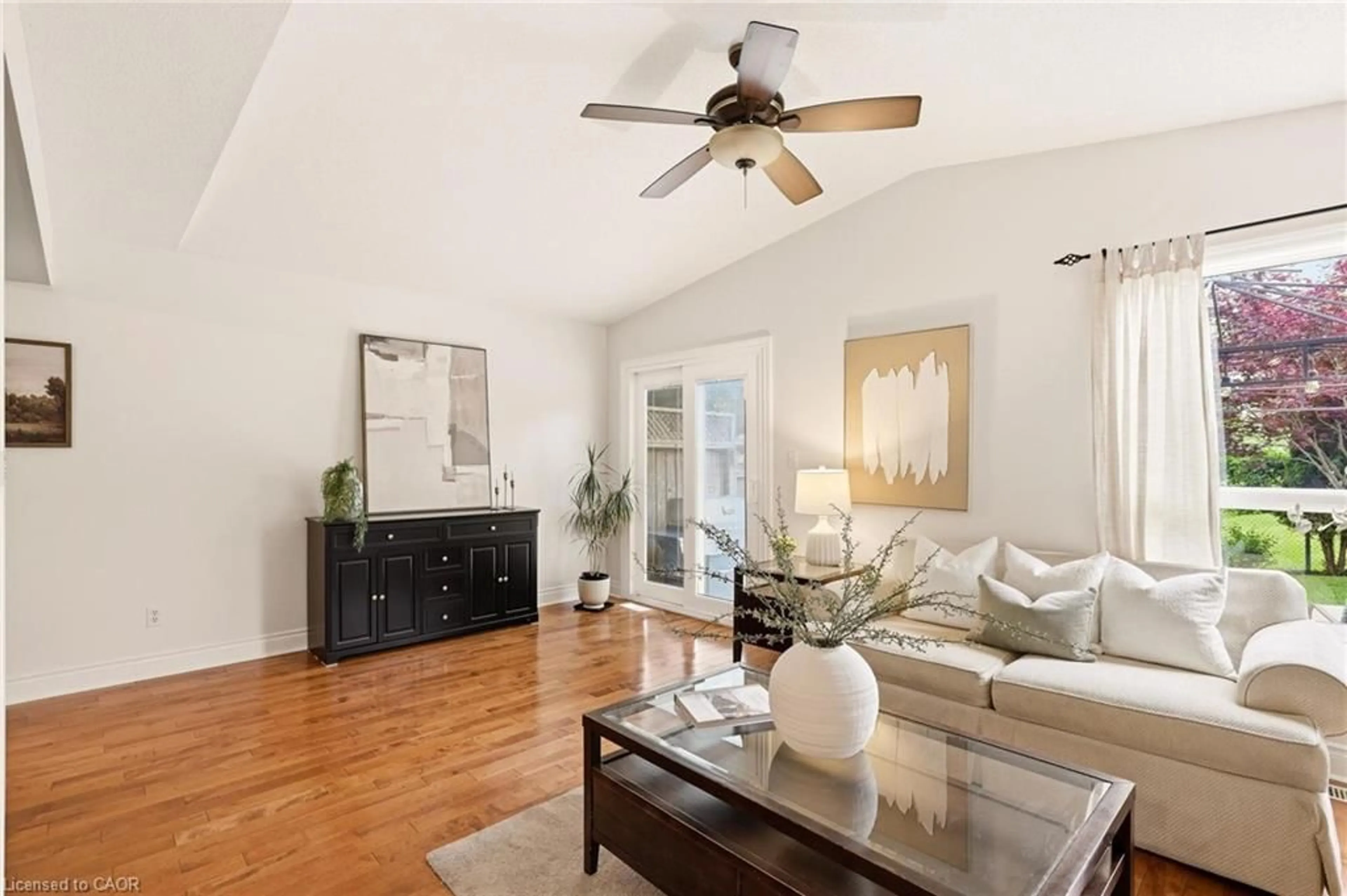 Living room with furniture, wood/laminate floor for 635 Royal Fern St, Waterloo Ontario N2V 2P6