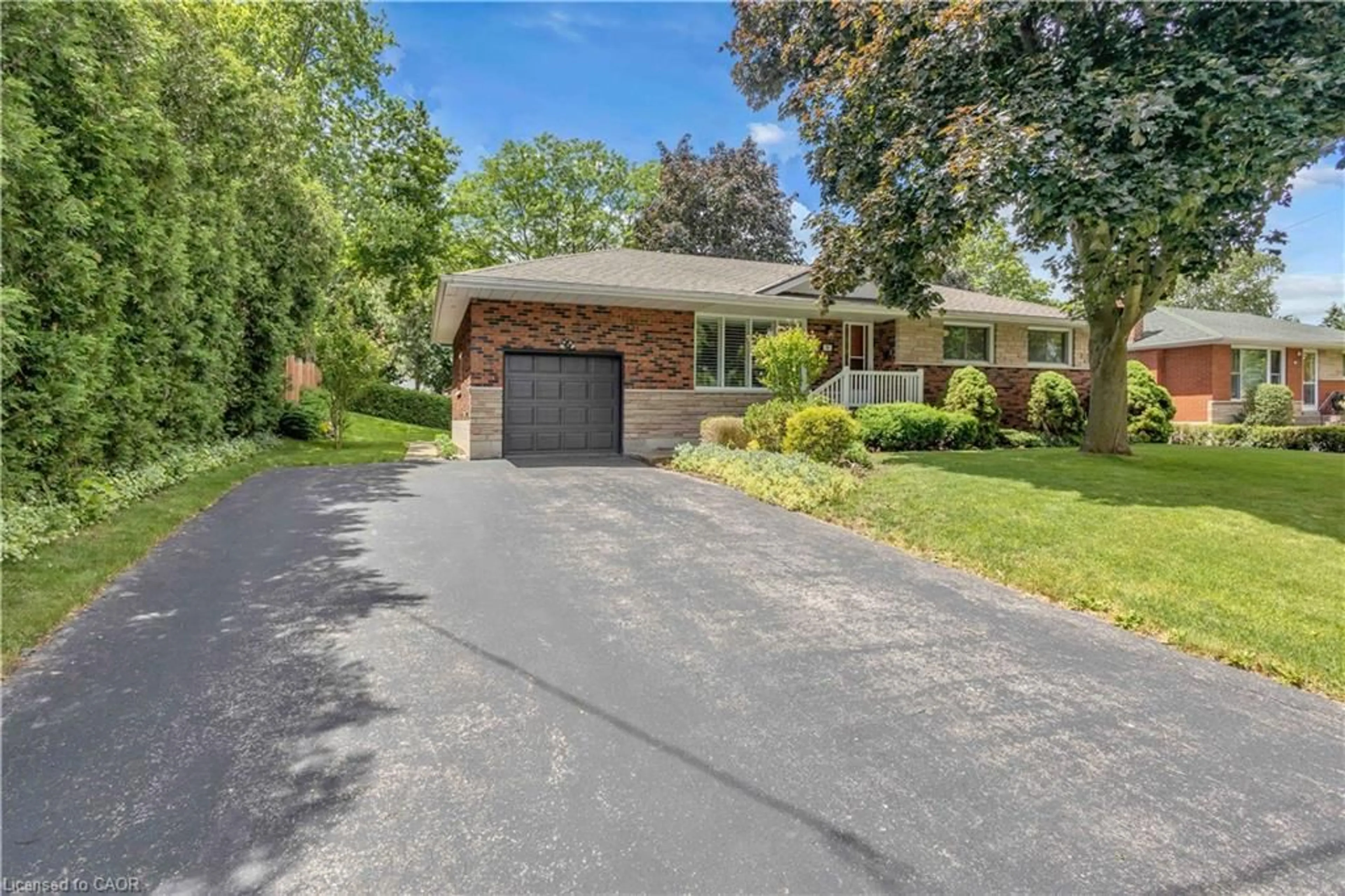 Home with brick exterior material, street for 99 Fife St, Caledonia Ontario N3W 1E7
