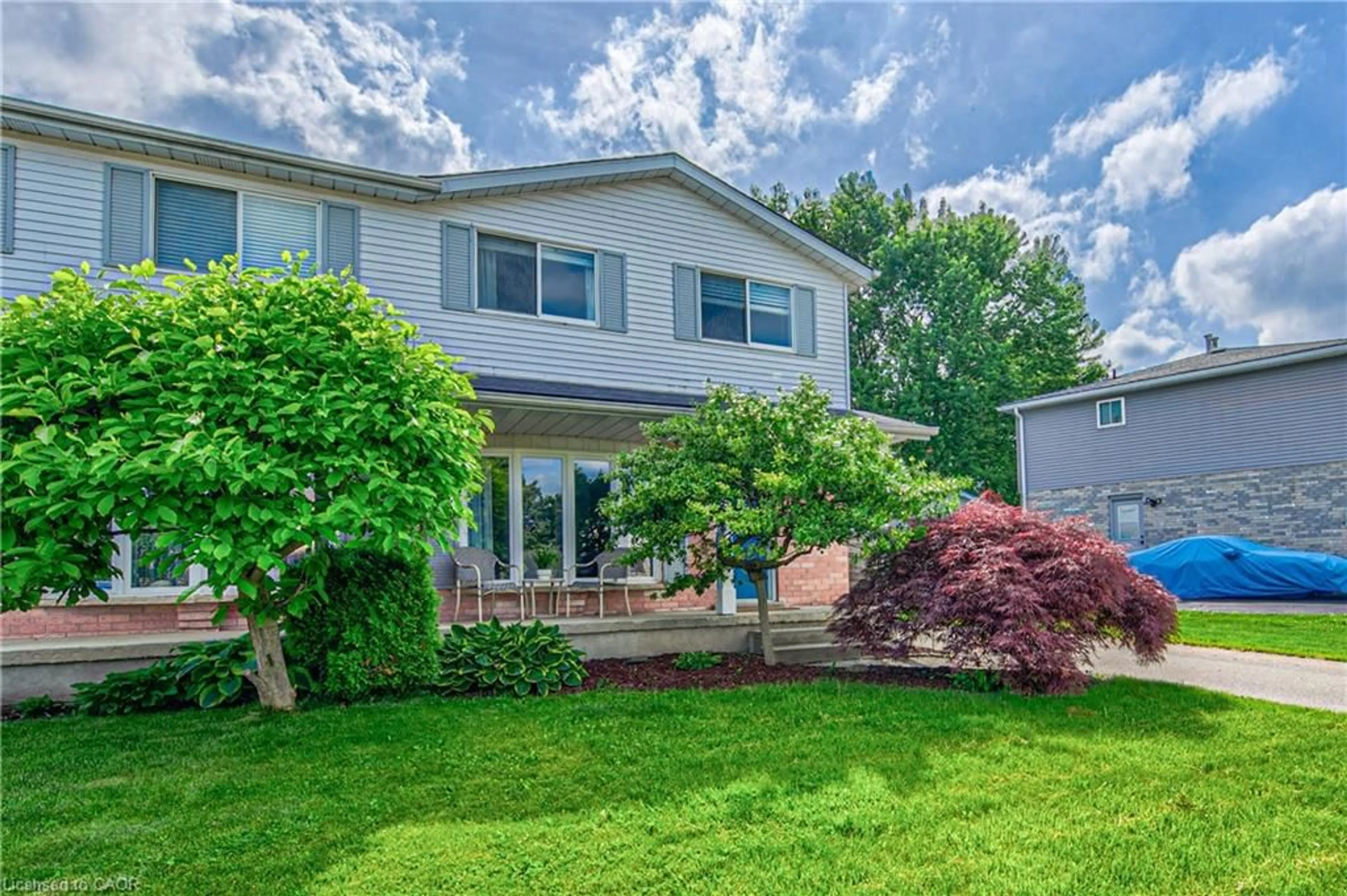 Home with vinyl exterior material, street for 29 Benesfort Dr, Kitchener Ontario N2N 3B4