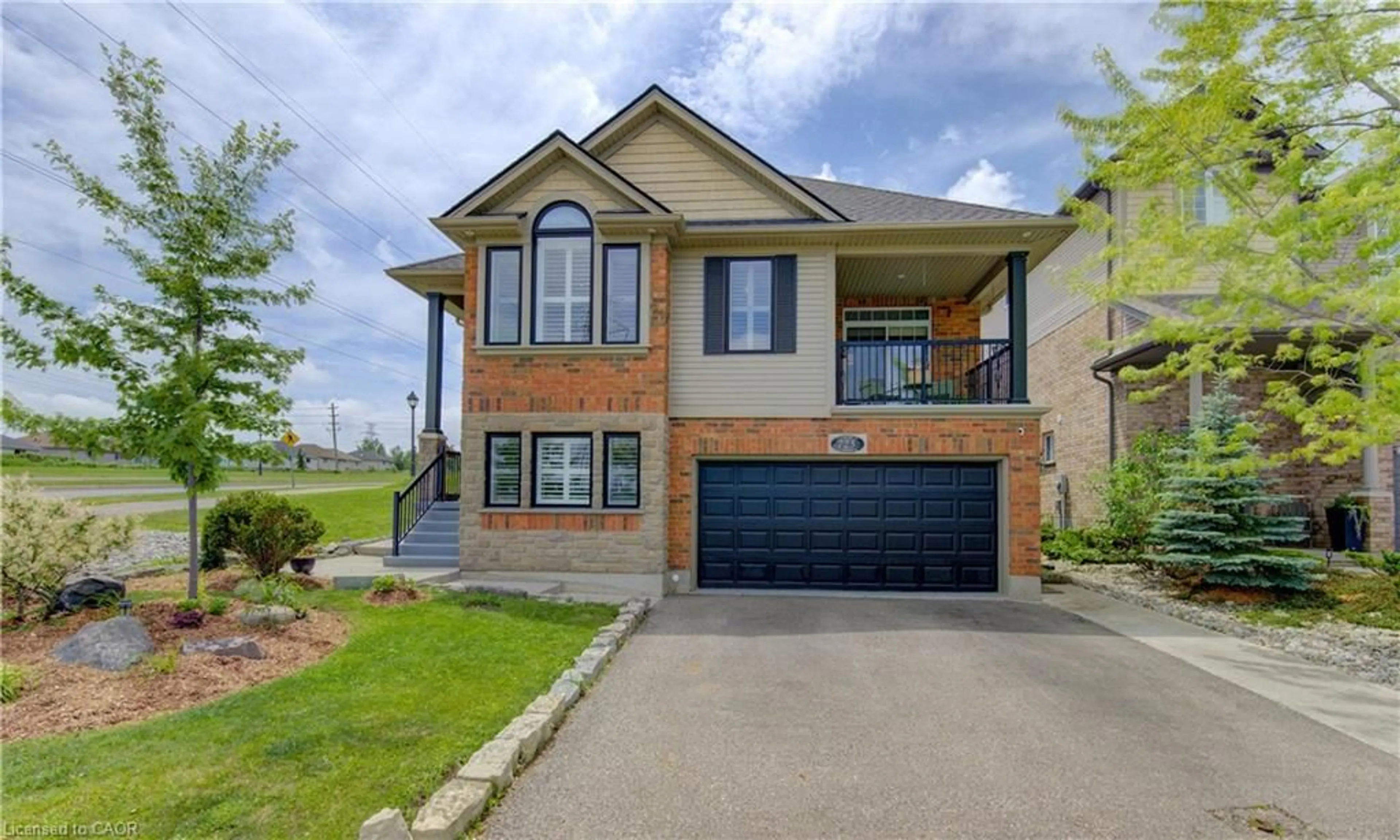Home with brick exterior material, street for 725 Zurich Dr, Waterloo Ontario N2V 2V4