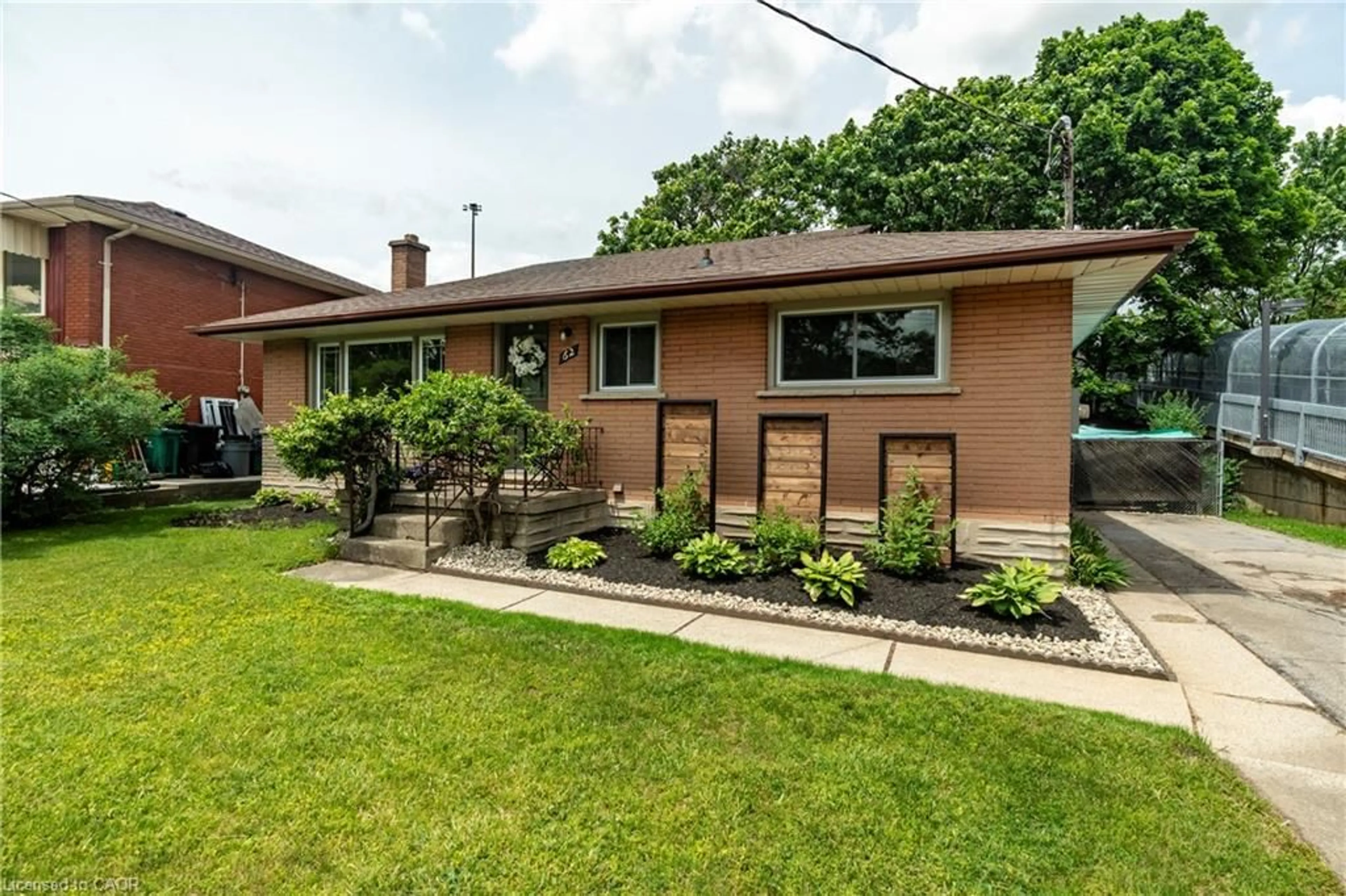 Home with brick exterior material, street for 62 Boniface Ave, Kitchener Ontario N2C 1L9