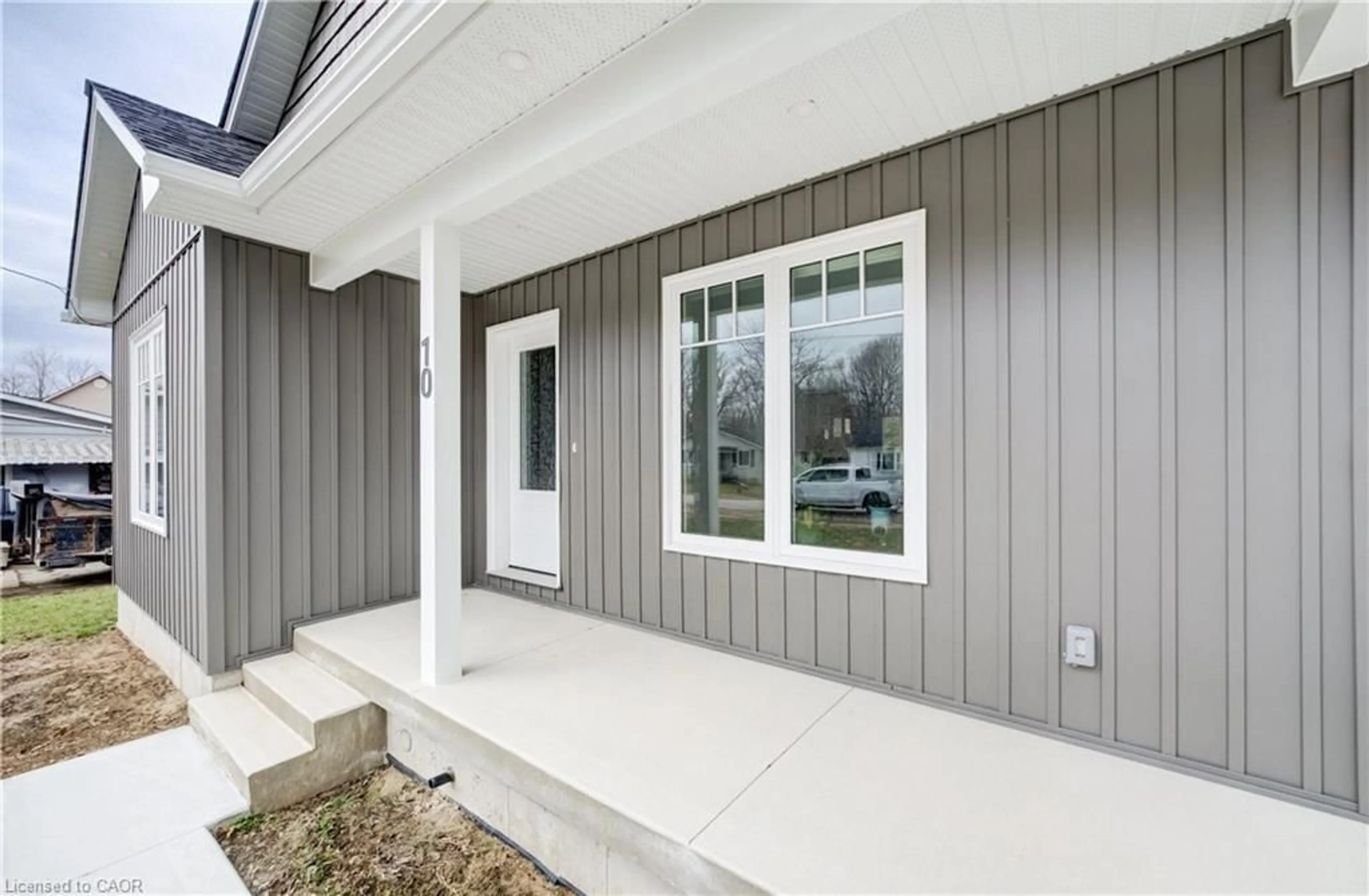 Home with vinyl exterior material, street for 10 Mill St, Otterville Ontario N0J 1R0