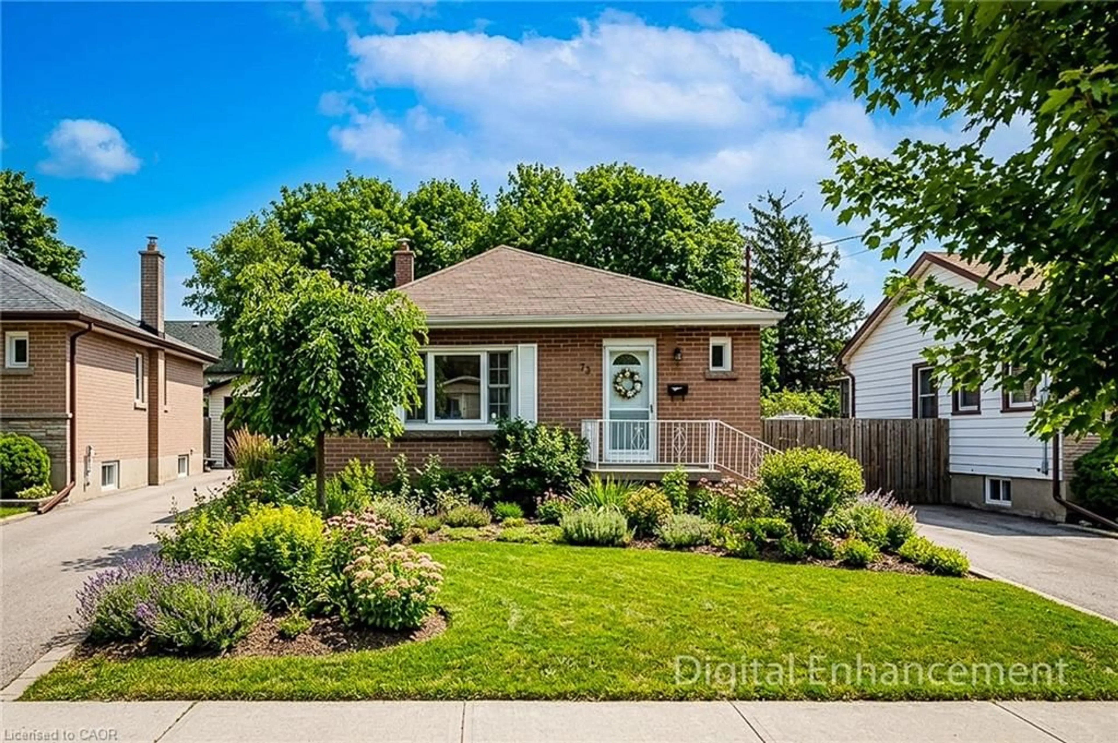 Home with brick exterior material, street for 73 West 1st St, Hamilton Ontario L9C 3C2