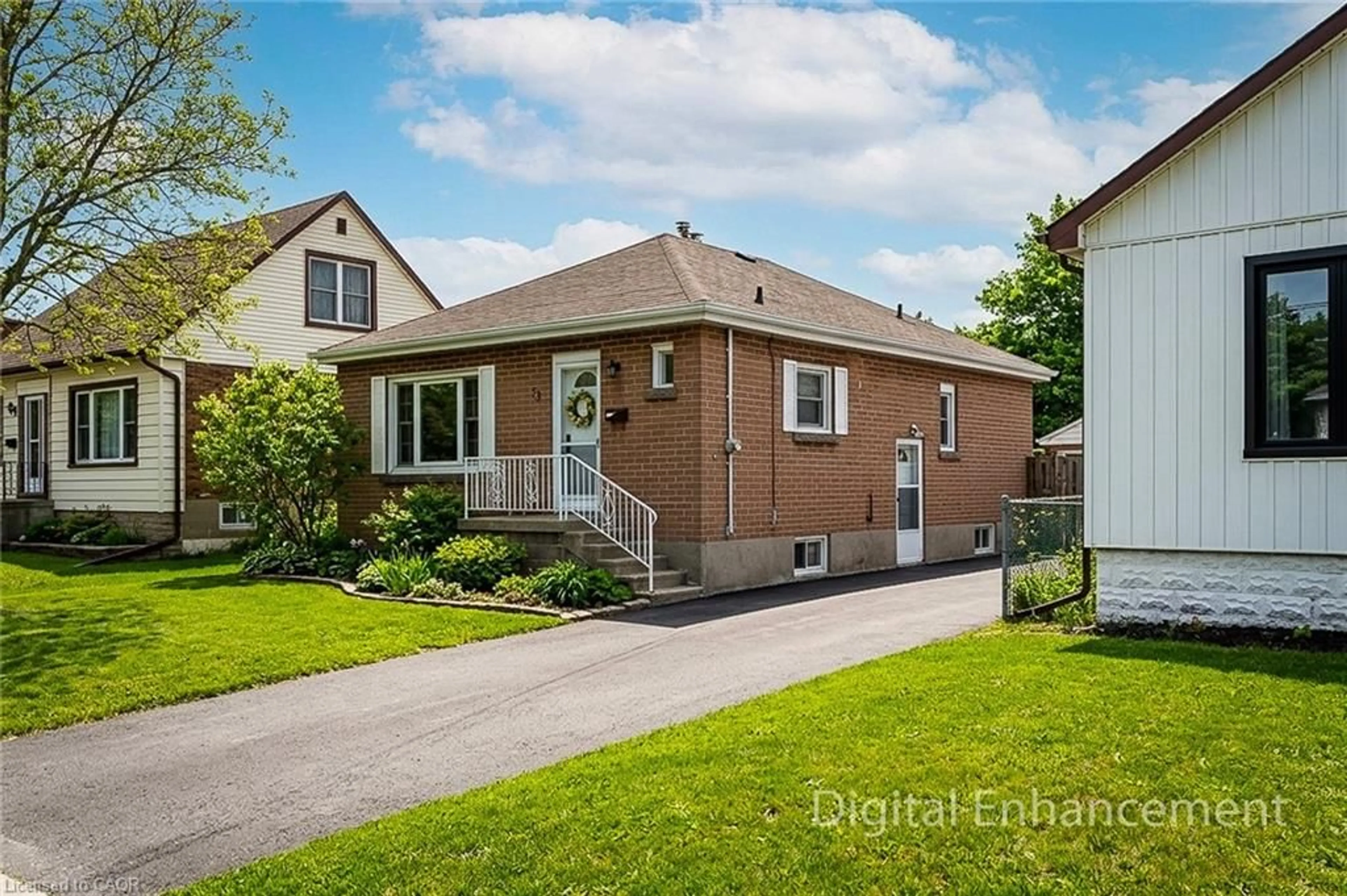 Home with brick exterior material, street for 73 West 1st St, Hamilton Ontario L9C 3C2