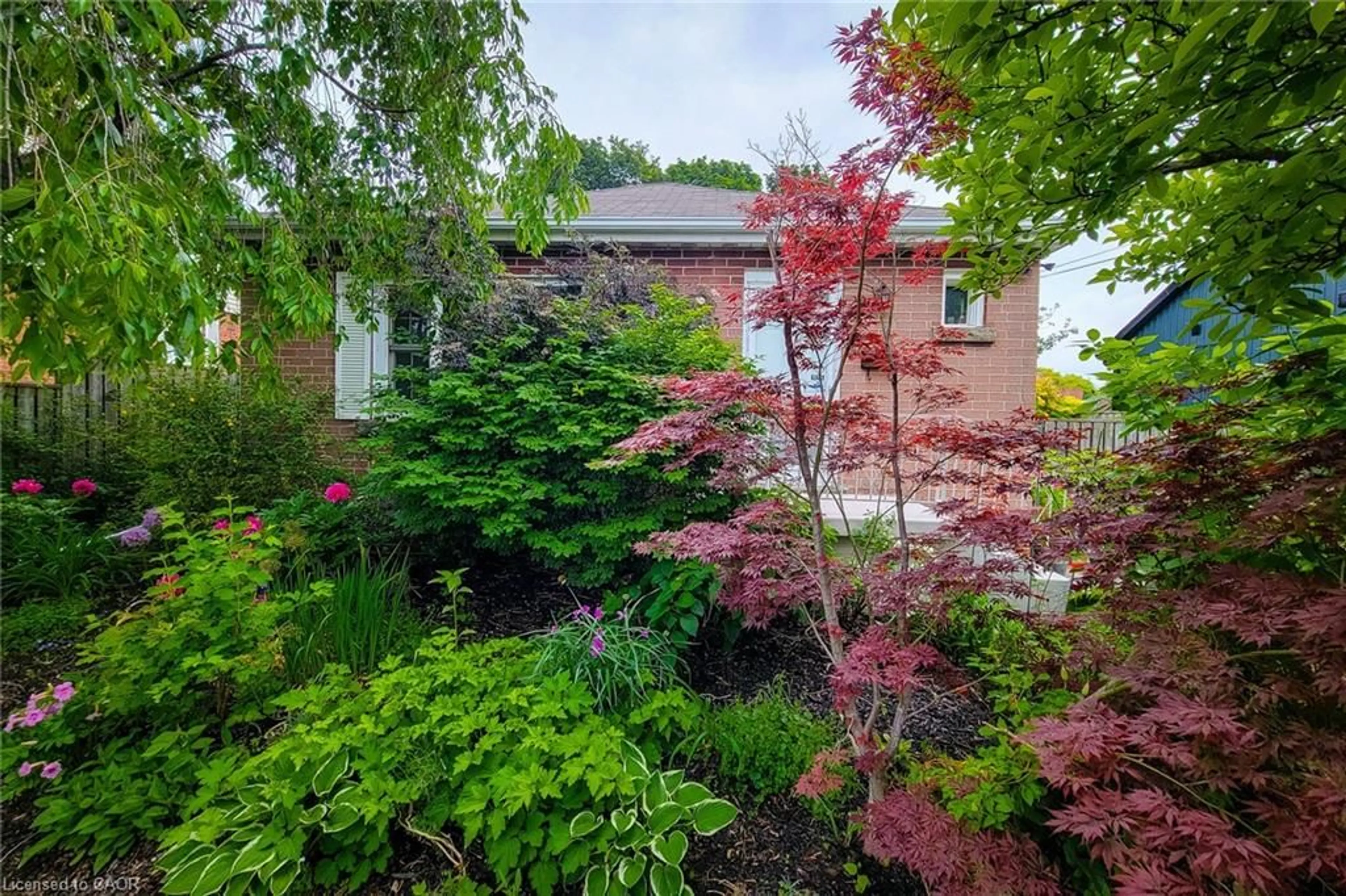 A pic from outside/outdoor area/front of a property/back of a property/a pic from drone, unknown for 73 West 1st St, Hamilton Ontario L9C 3C2