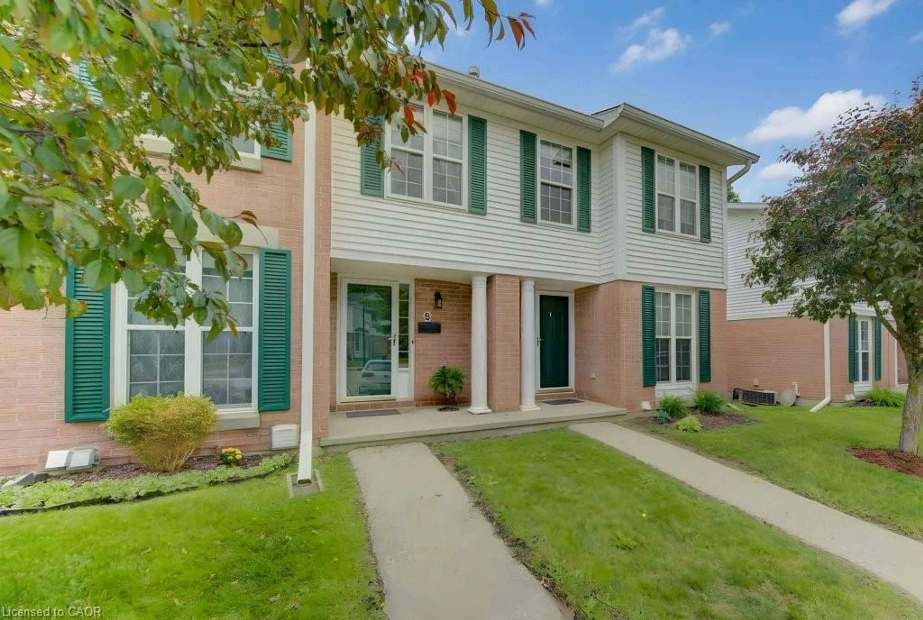 Home with brick exterior material, street for 465 Woolwich St #8, Waterloo Ontario N2K 3S4