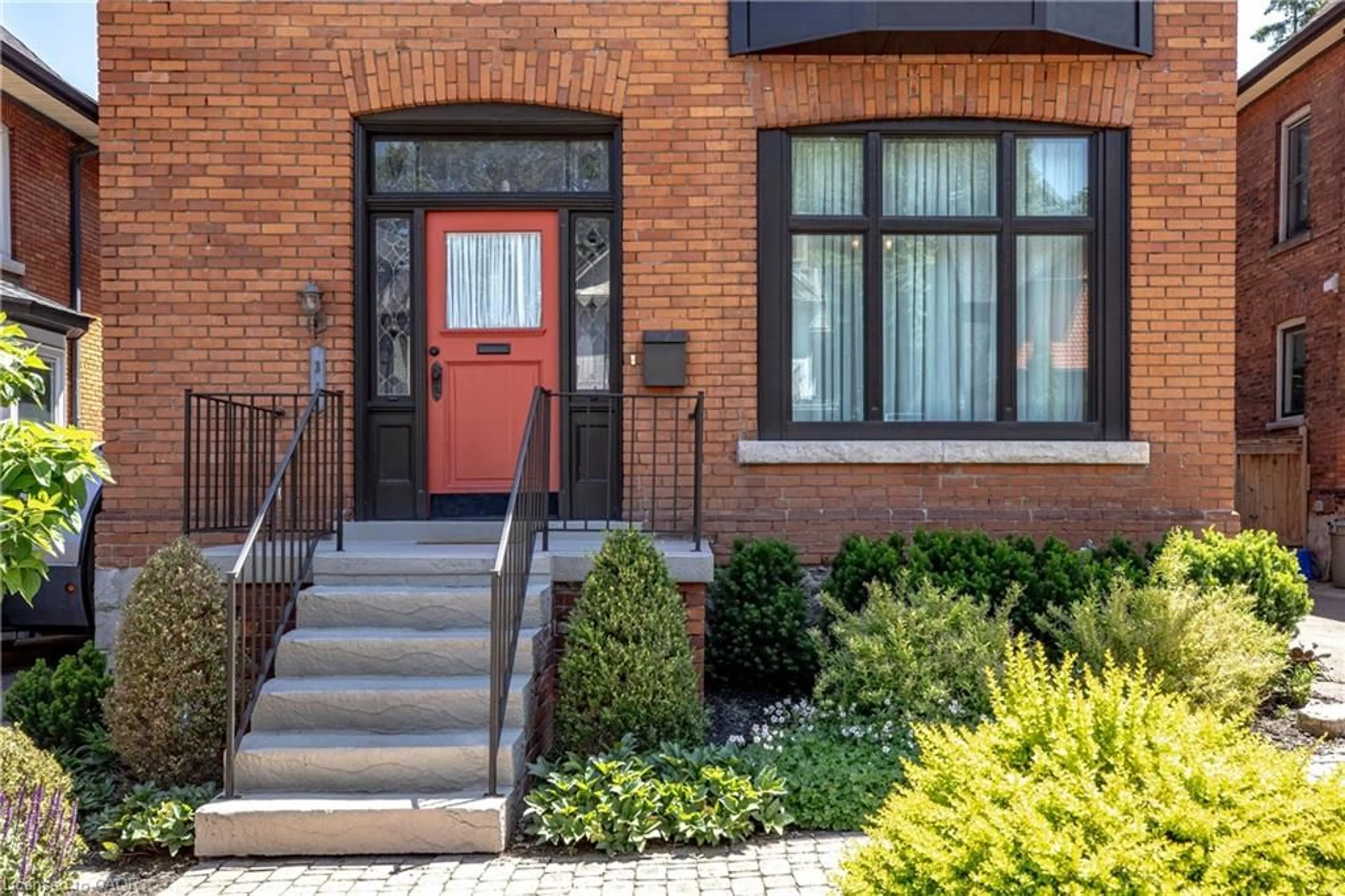 Home with brick exterior material, street for 31 Spruceside Ave, Hamilton Ontario L8P 3Y2