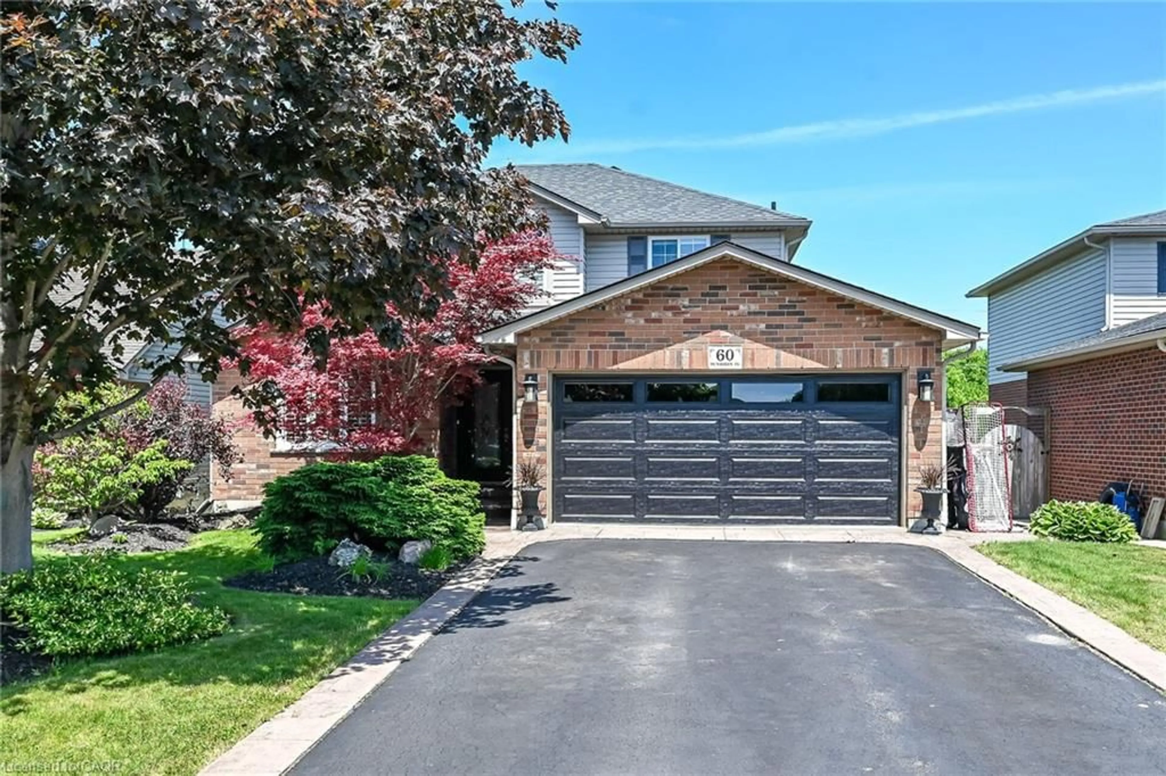 Home with brick exterior material, street for 60 Dunrobin Dr, Caledonia Ontario N3W 2N7