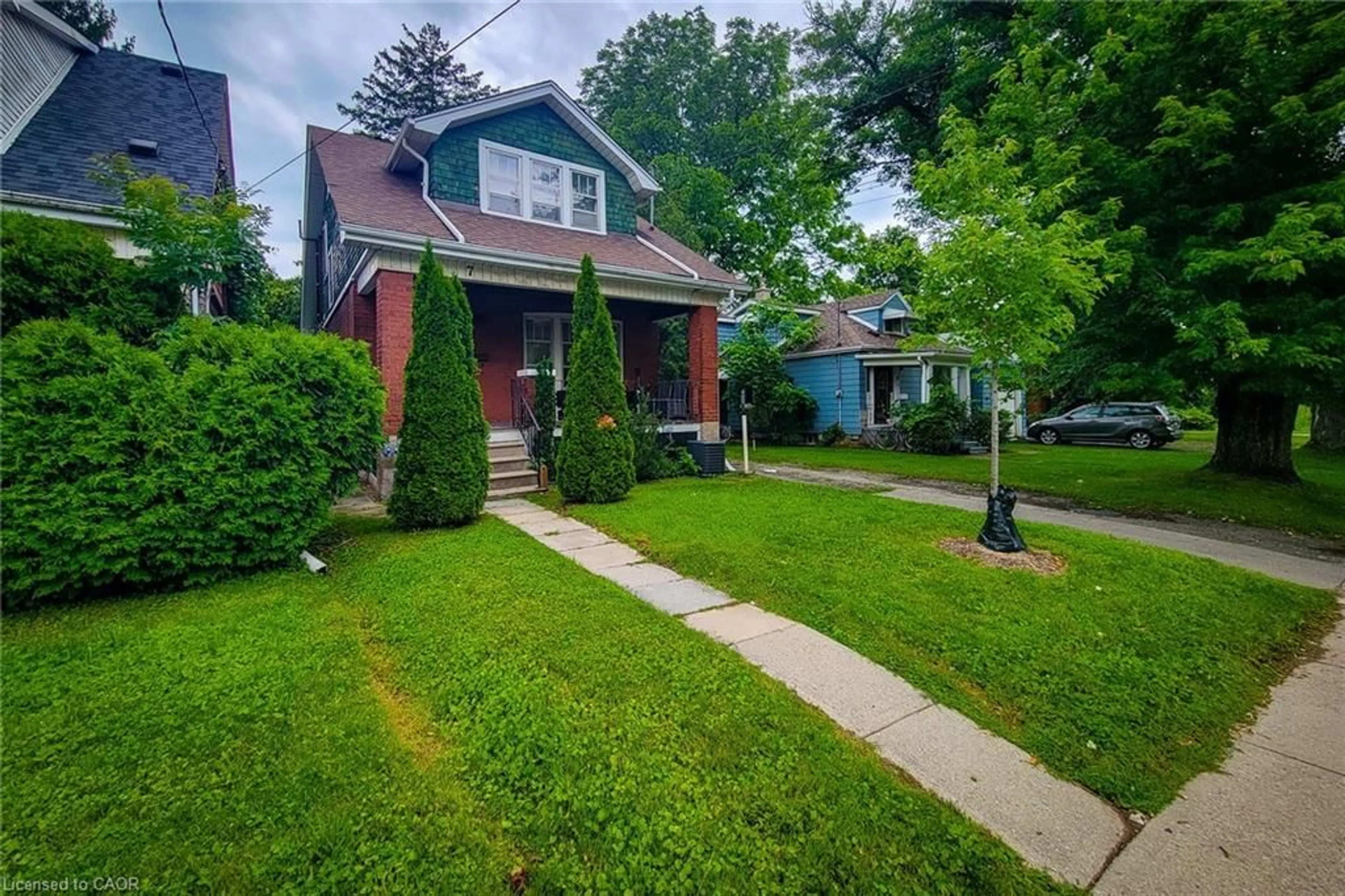 Home with brick exterior material, street for 7 Norfolk St, Hamilton Ontario L8S 3J9