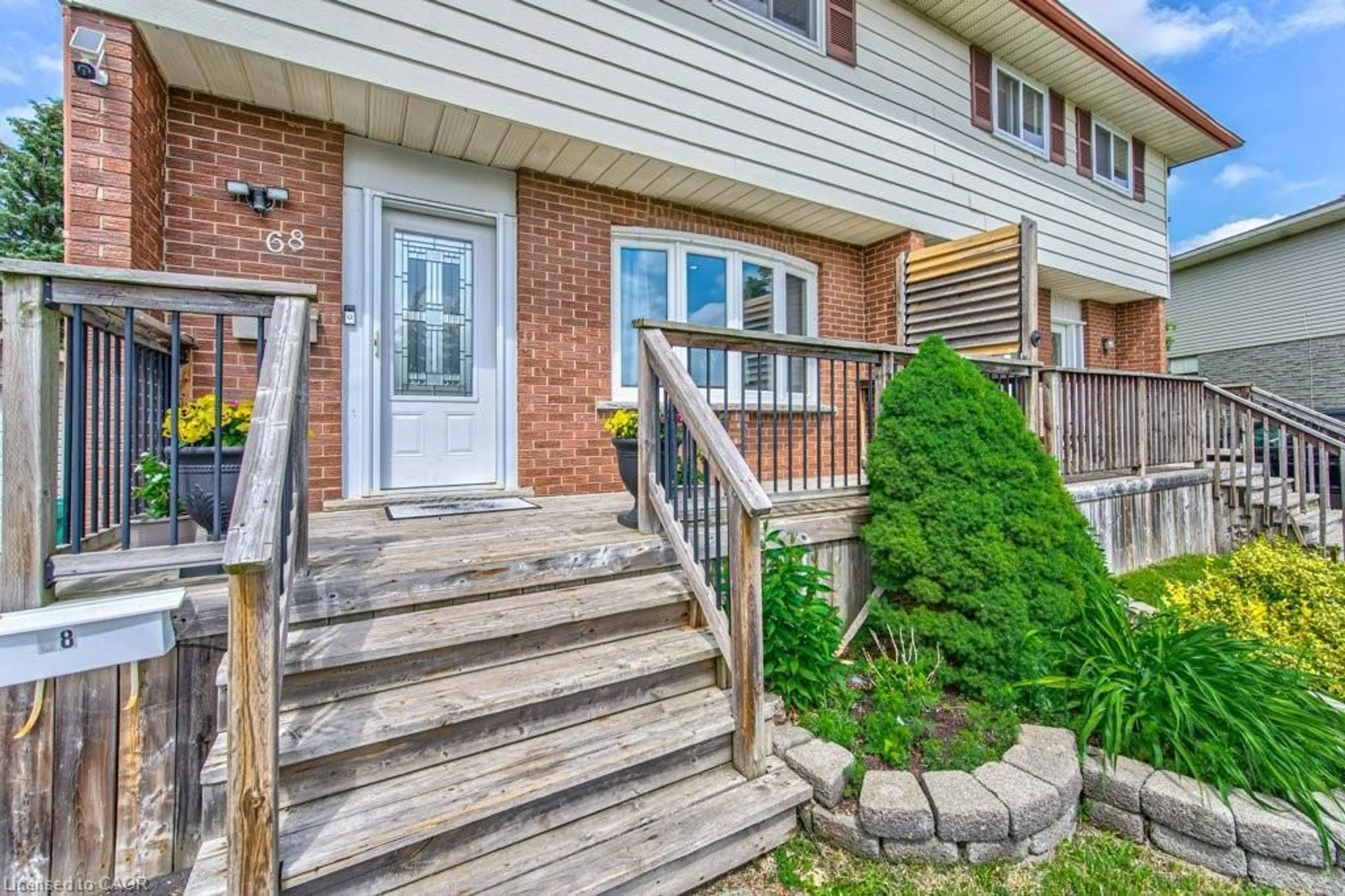 Home with brick exterior material, street for 68 The Country Way, Kitchener Ontario N2E 2K8
