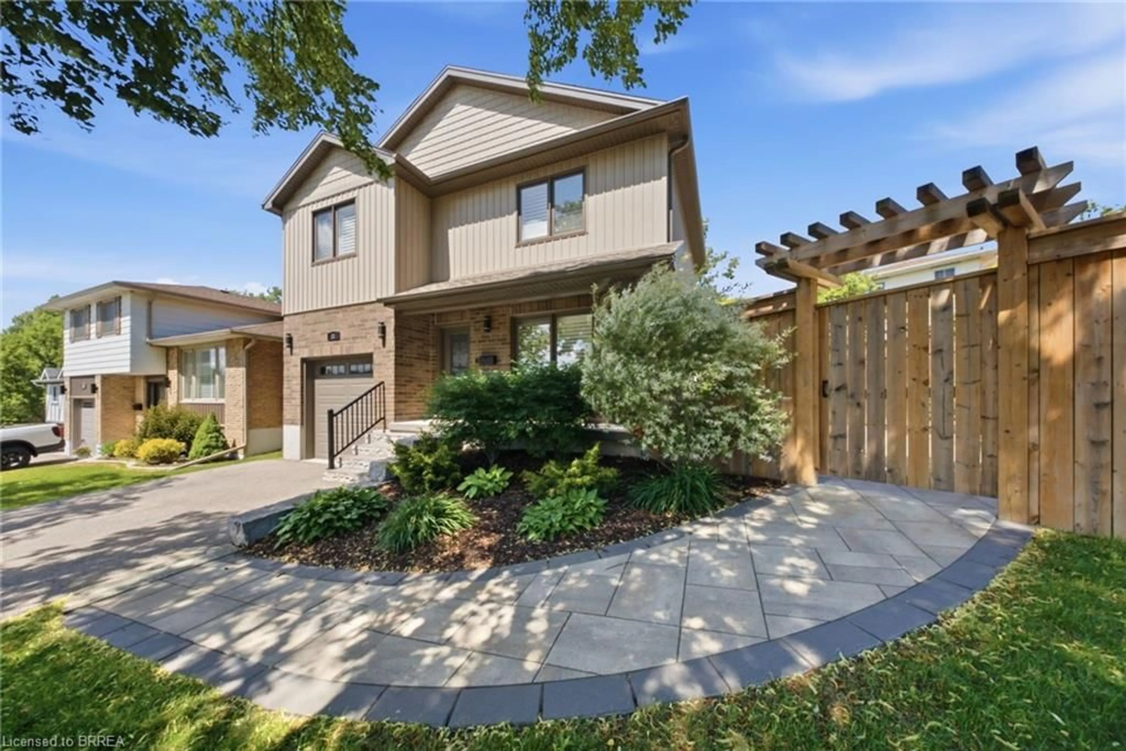 Home with brick exterior material, street for 21 Sandy Row, Brantford Ontario N3T 5Z3