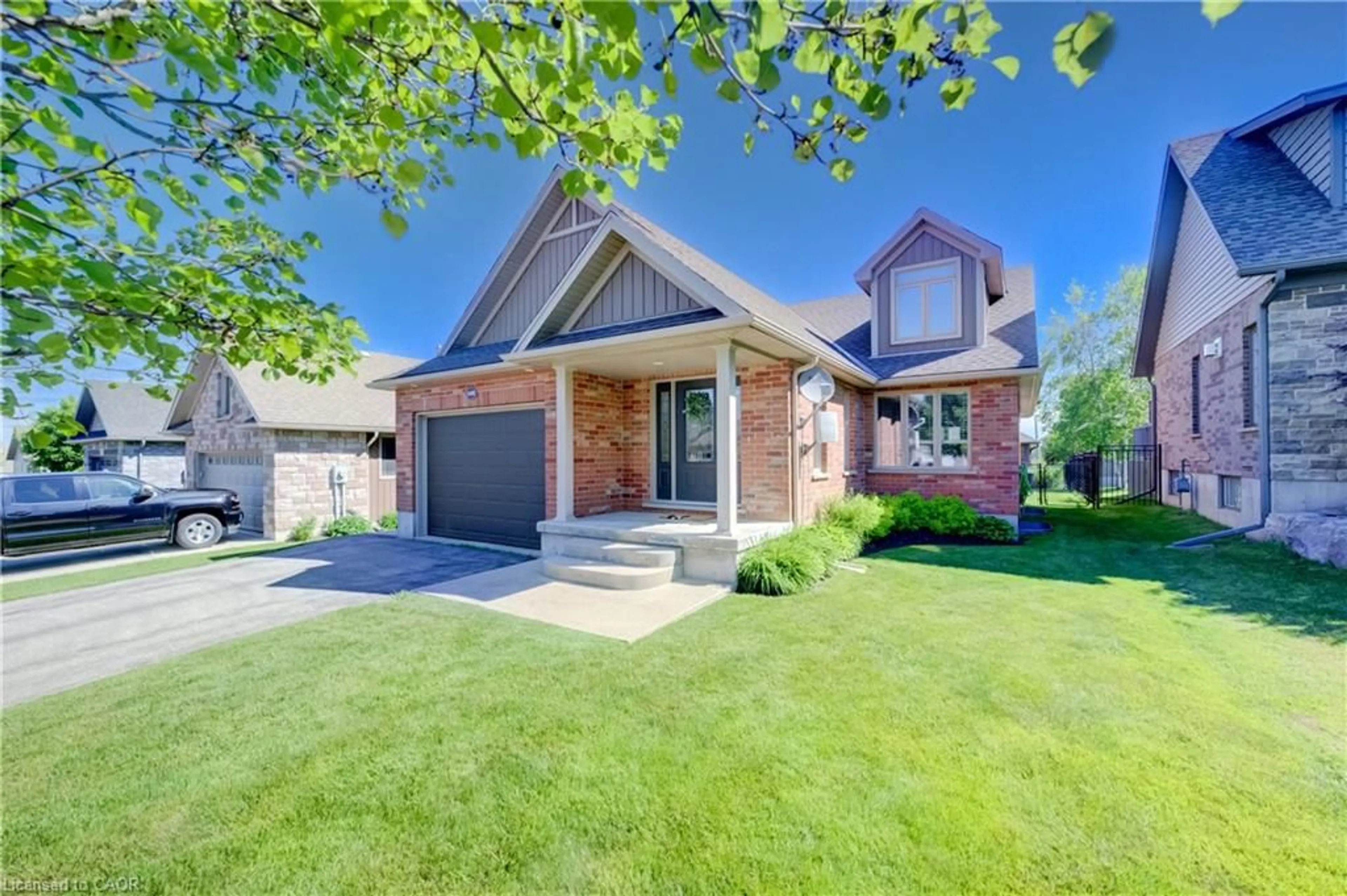 Home with brick exterior material, street for 108 Ruby's Cres, Mount Forest Ontario N0G 2L2