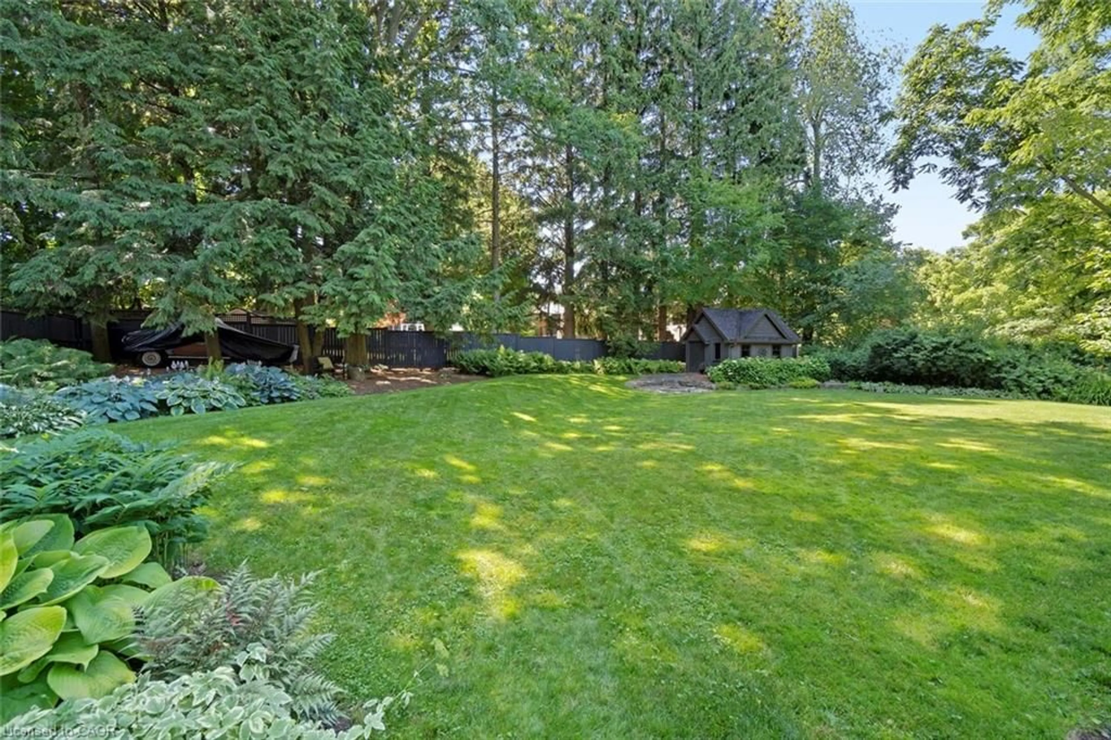 Patio, forest/trees view for 58 Central Dr, Hamilton Ontario L9G 2A2