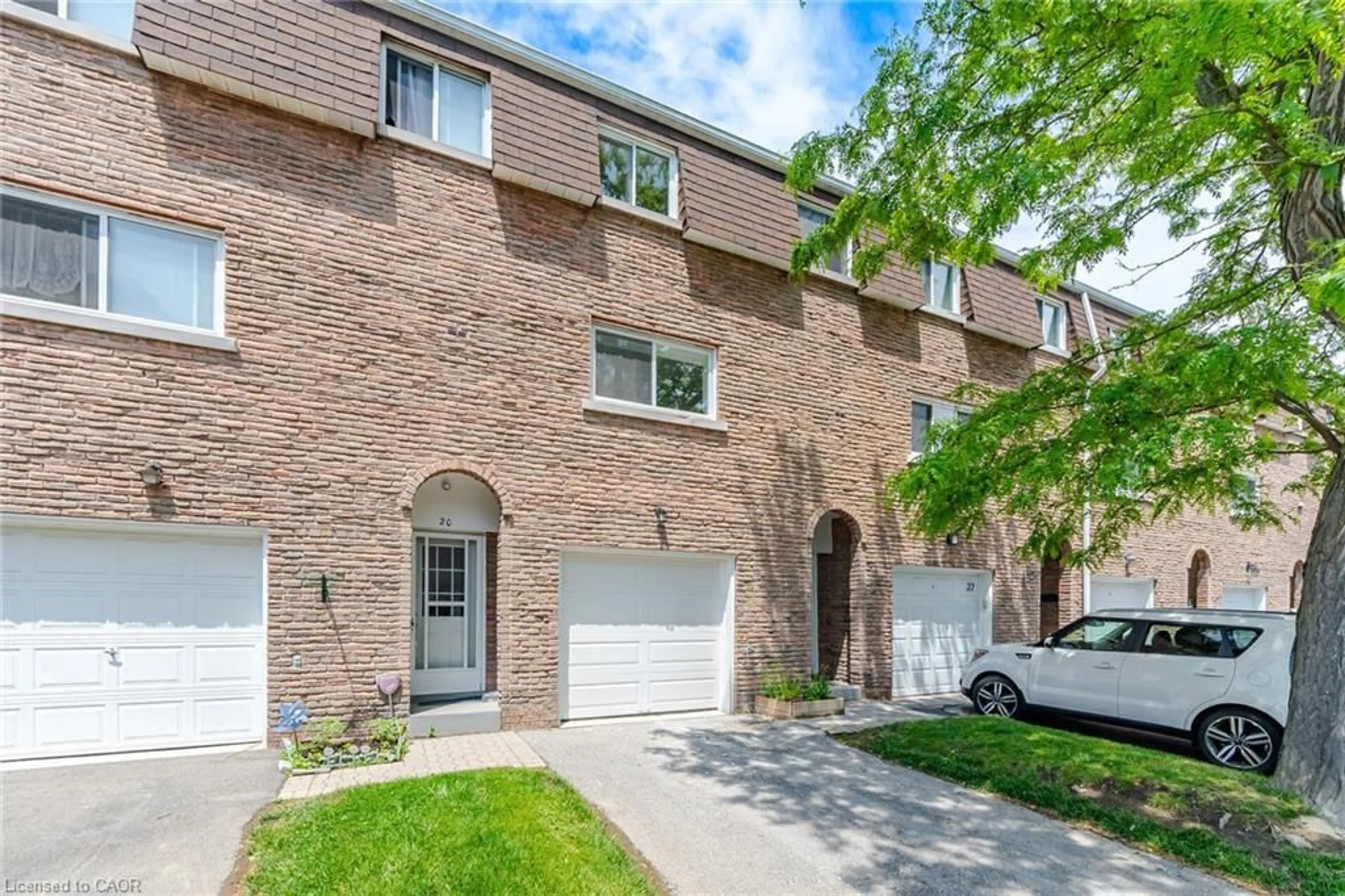 Home with brick exterior material, street for 121 Centennial Rd #21, Toronto Ontario M1C 1Z7