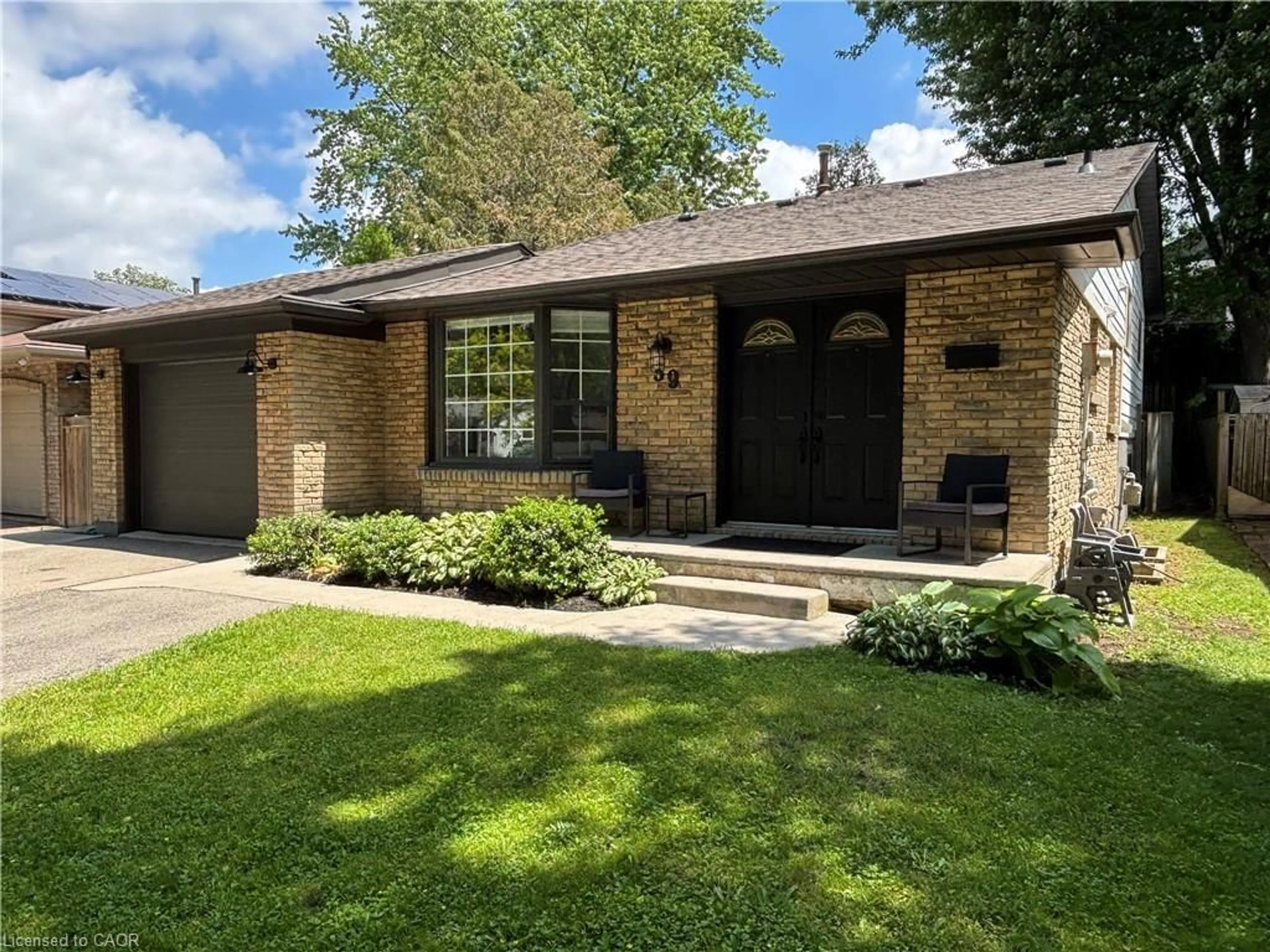 Home with brick exterior material, street for 39 Forestgate Dr, Hamilton Ontario L9C 6A4