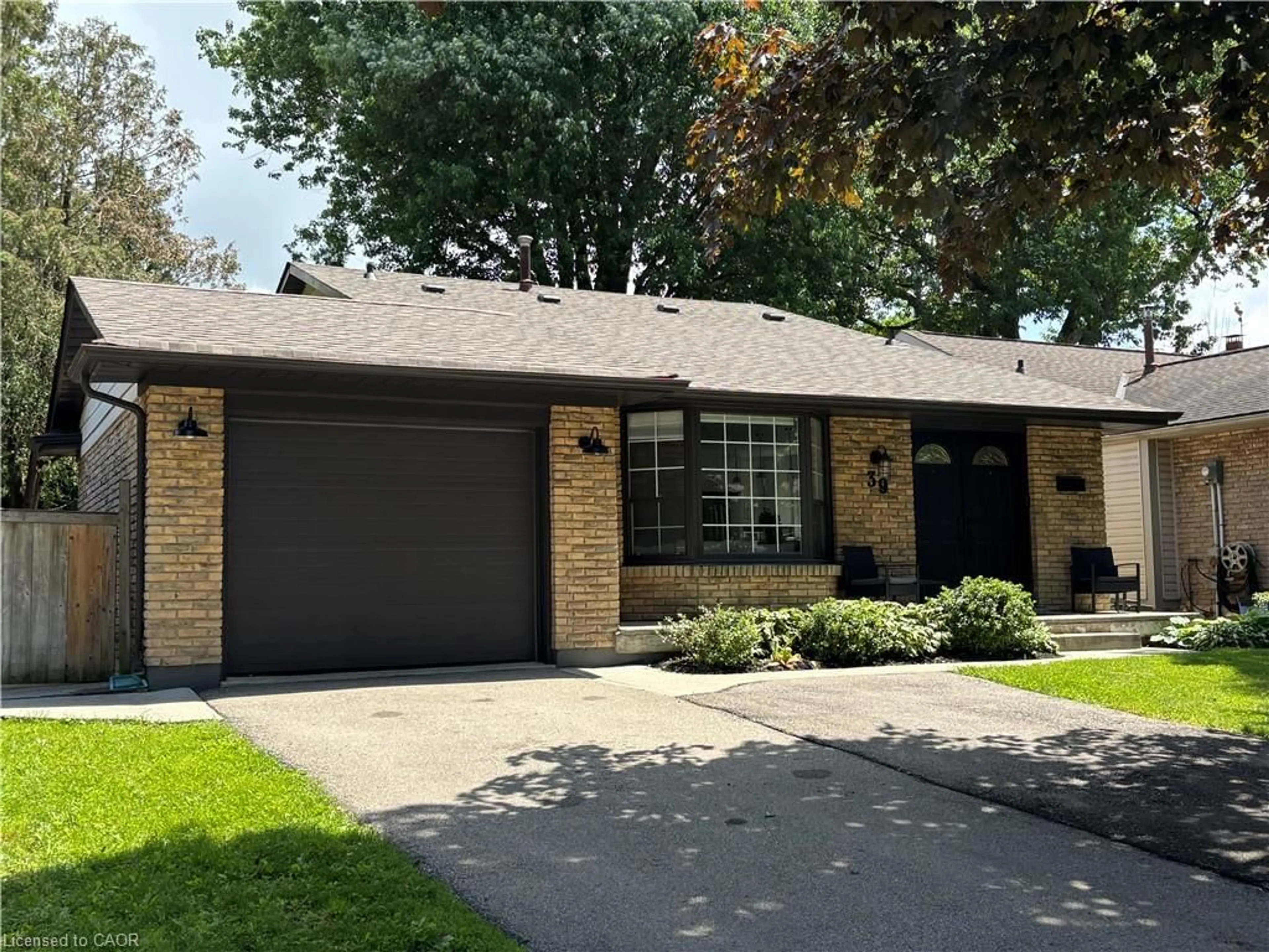 Home with brick exterior material, street for 39 Forestgate Dr, Hamilton Ontario L9C 6A4