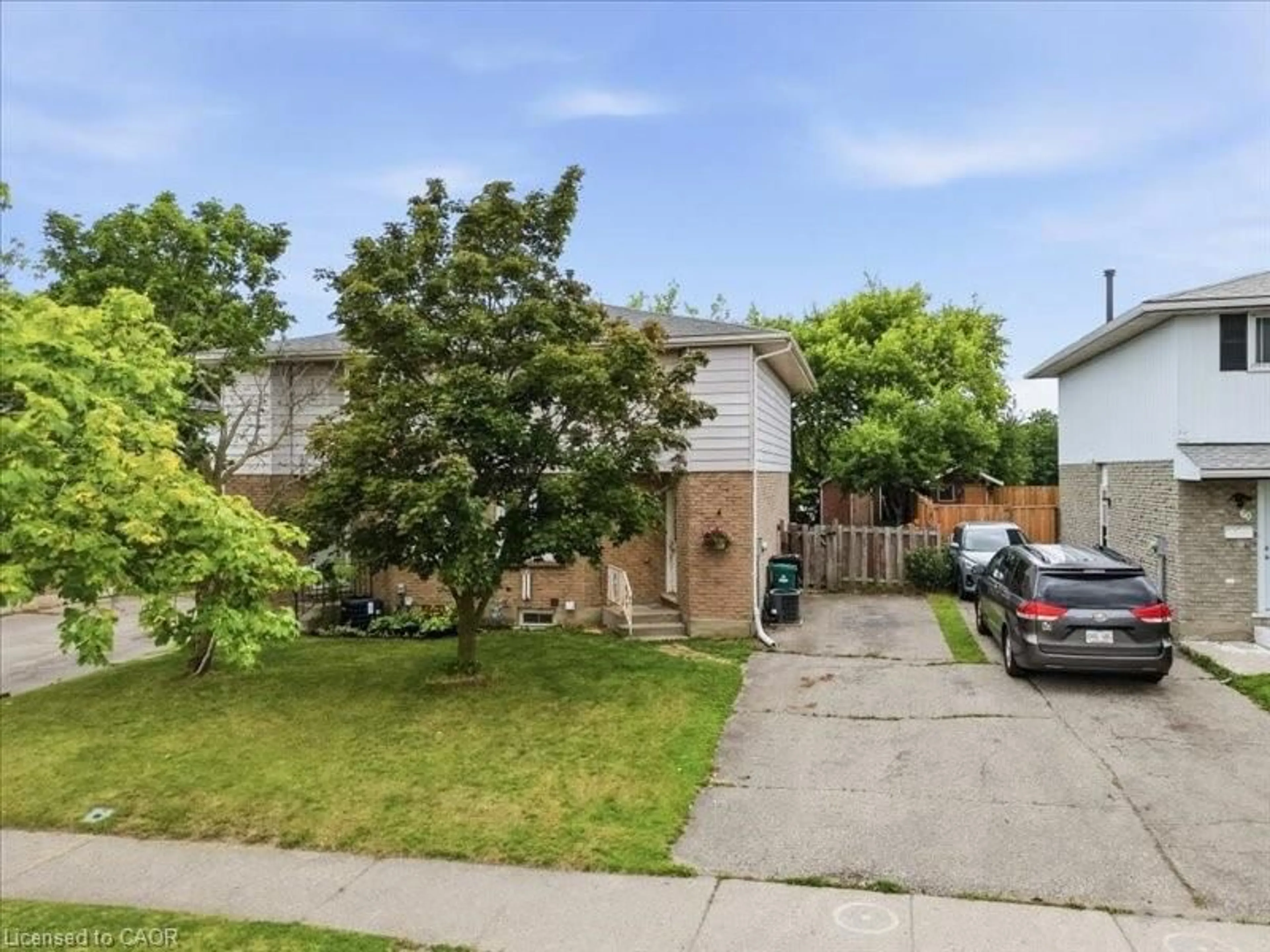 A pic from outside/outdoor area/front of a property/back of a property/a pic from drone, street for 58 The Country Way, Kitchener Ontario N2E 2K8