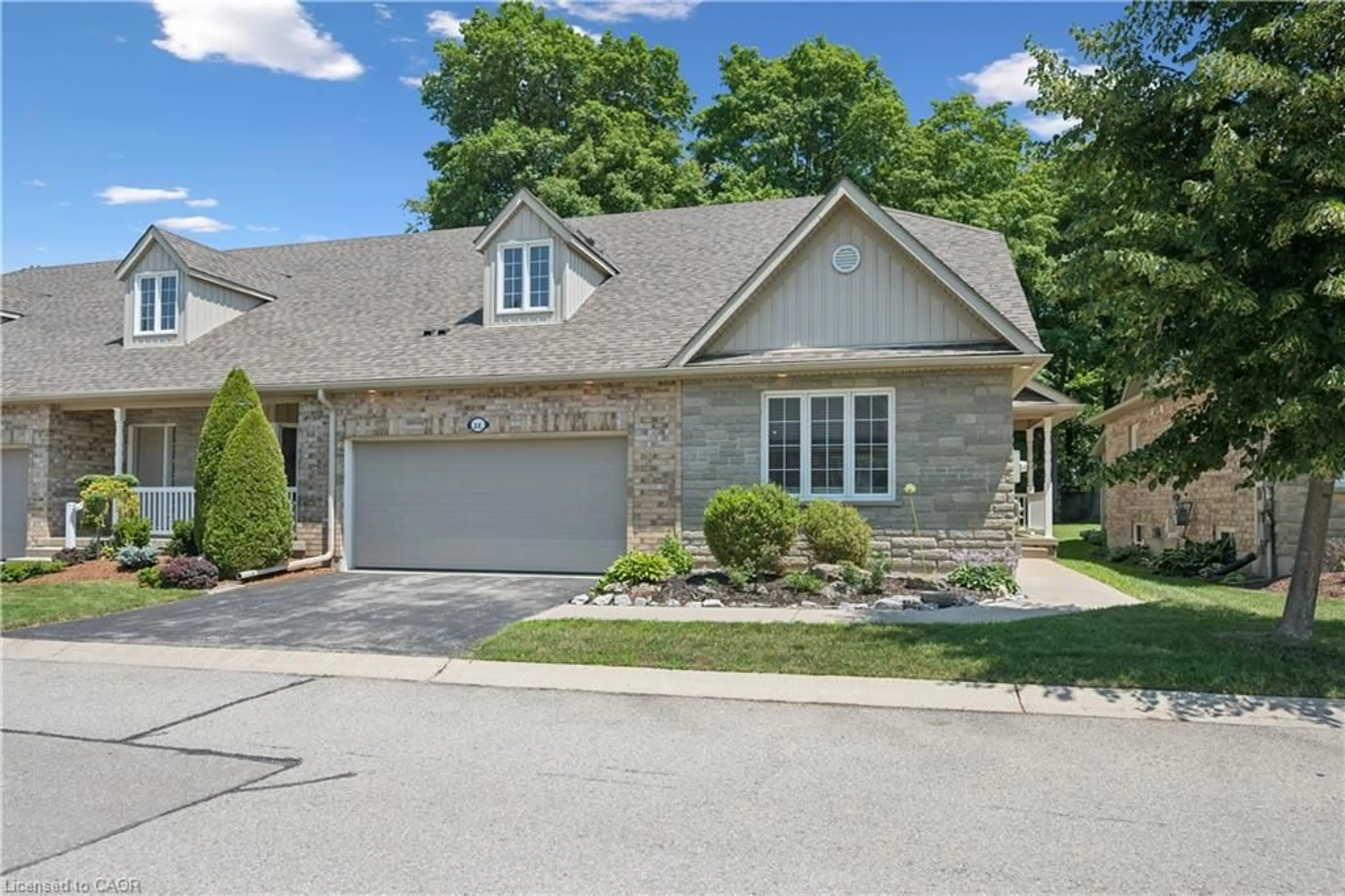 Home with brick exterior material, street for 350 Doon Valley Dr #3E, Kitchener Ontario N2P 2M9