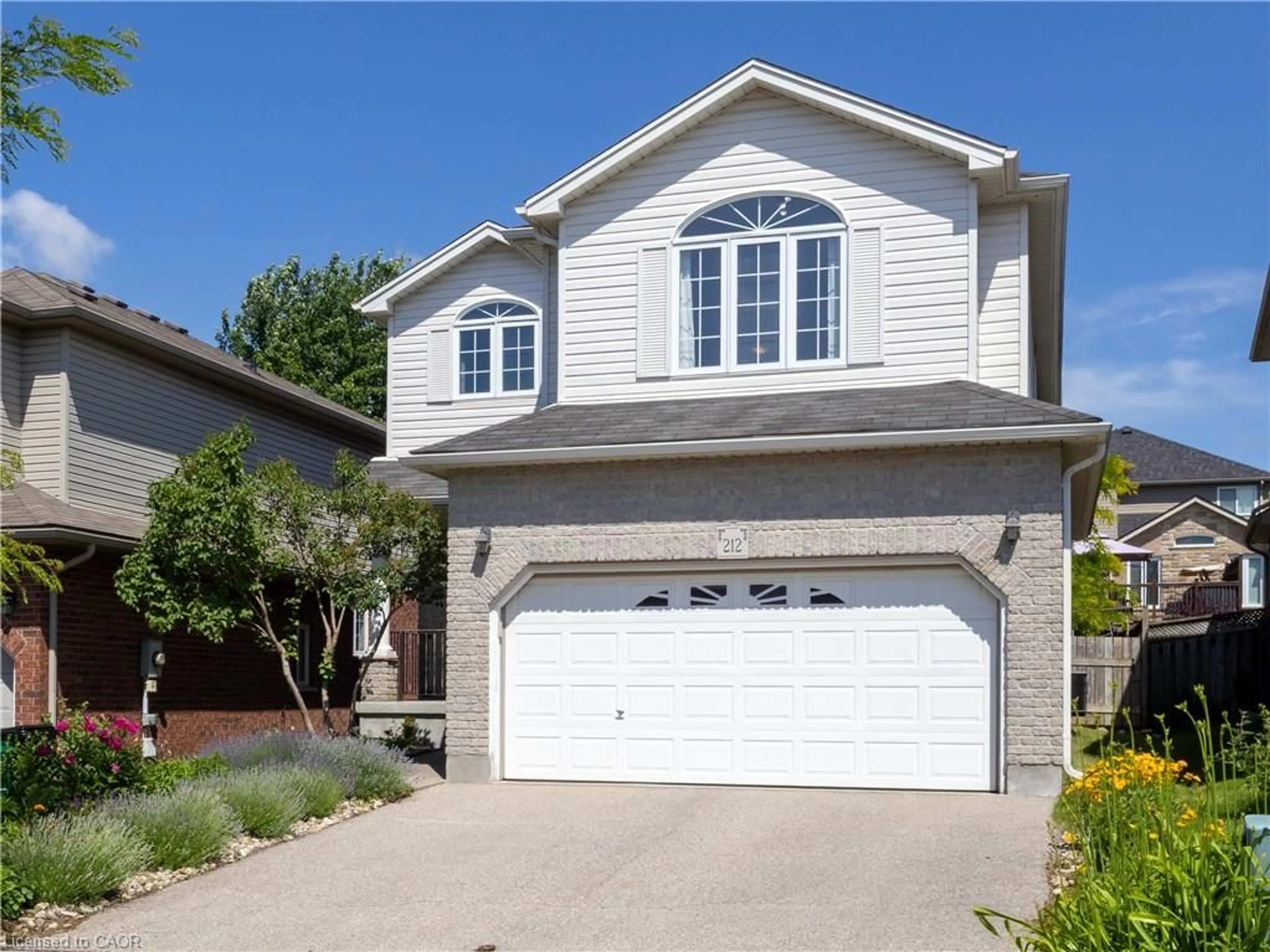 Home with vinyl exterior material, street for 212 Sleaford St, Waterloo Ontario N2J 4Z8