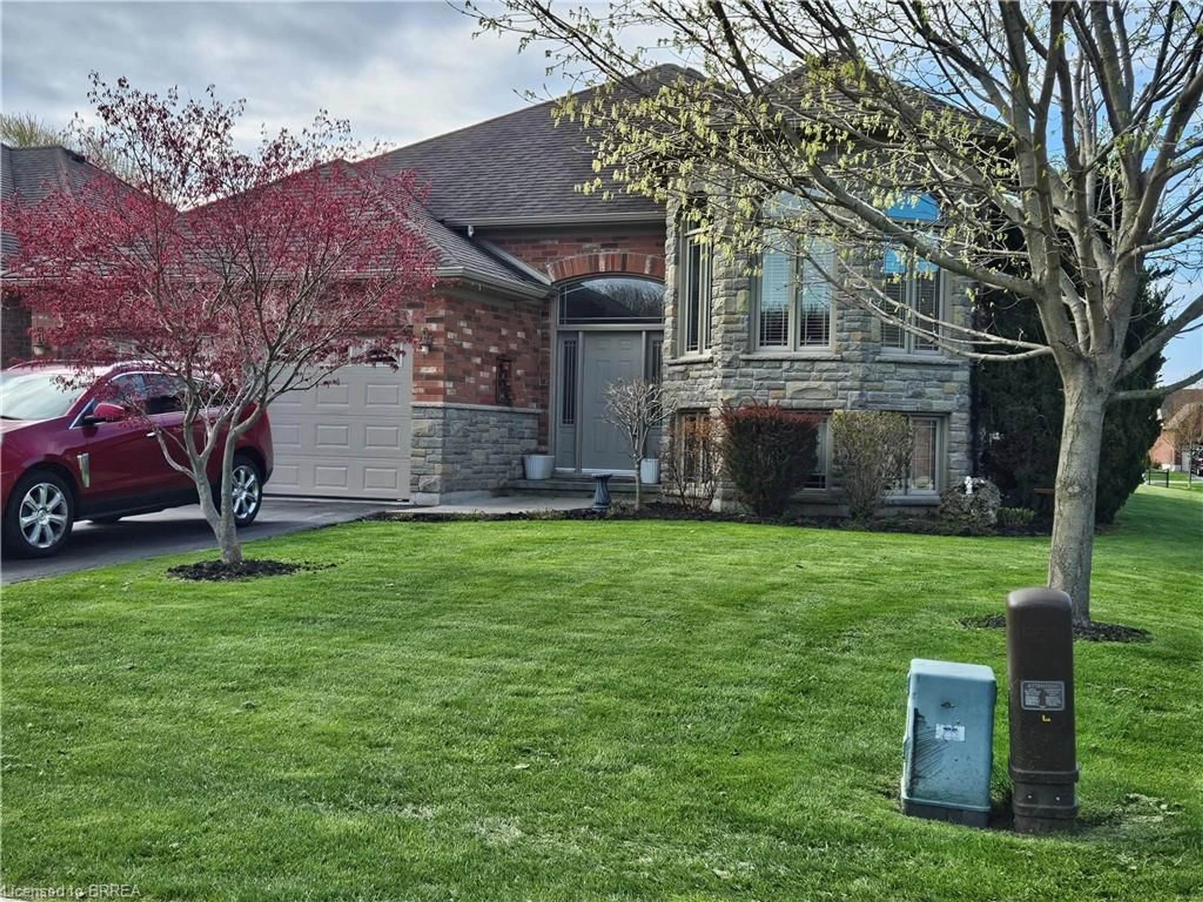 Home with brick exterior material, street for 48 Willowdale Cres, Port Dover Ontario N0A 1N5