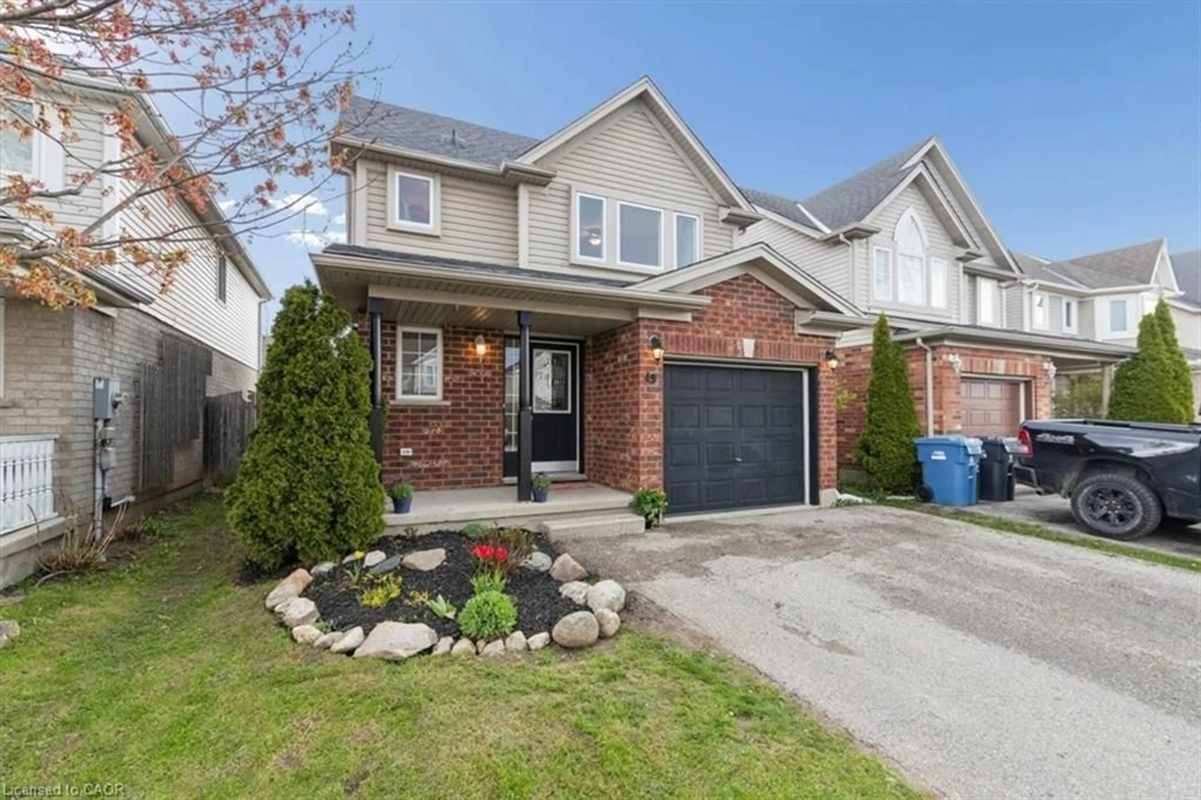 Home with brick exterior material, street for 49 Schiedel Dr, Guelph Ontario N1E 7M3