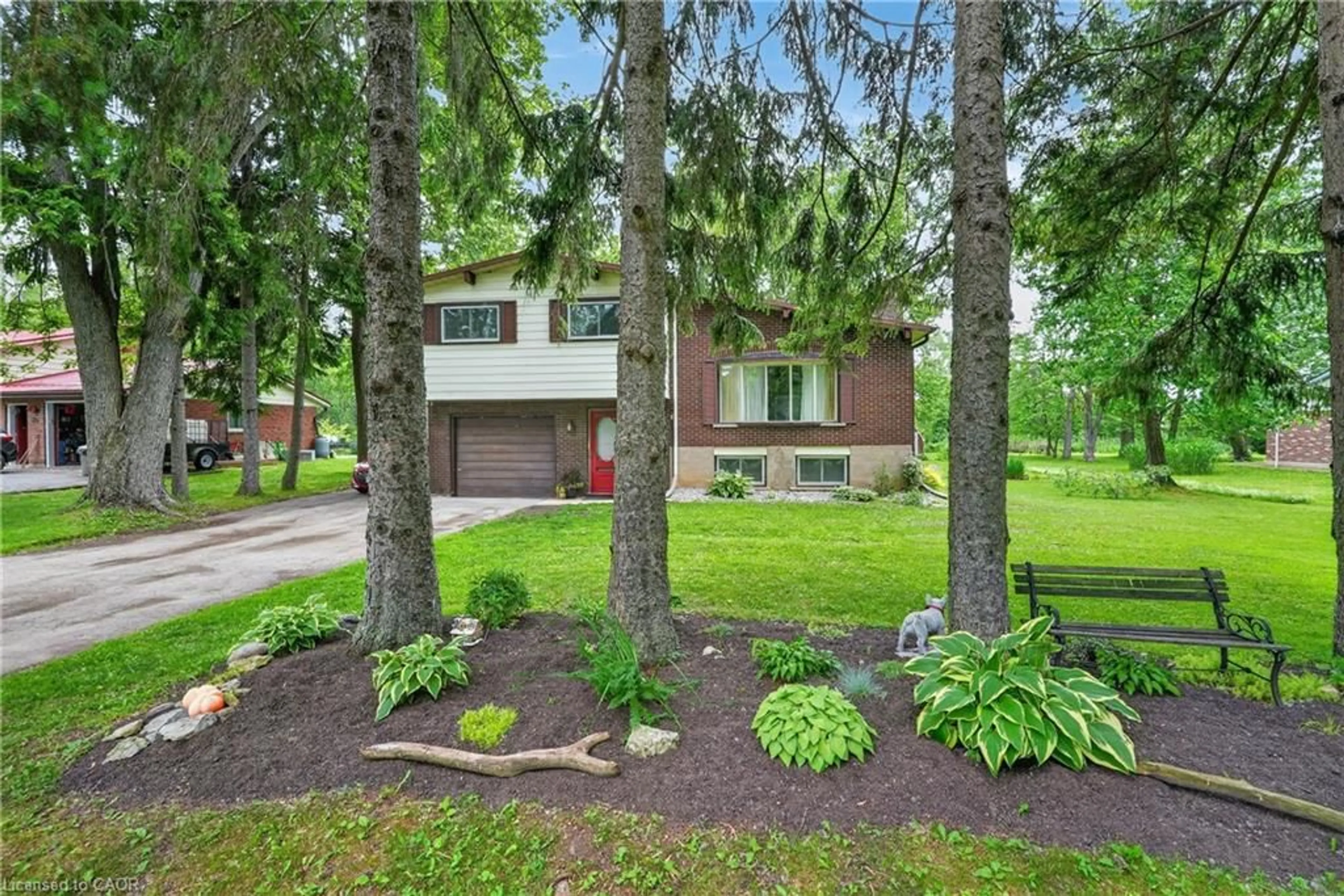 Home with brick exterior material, street for 124 Mumby Rd, Dunnville Ontario N1A 2W5