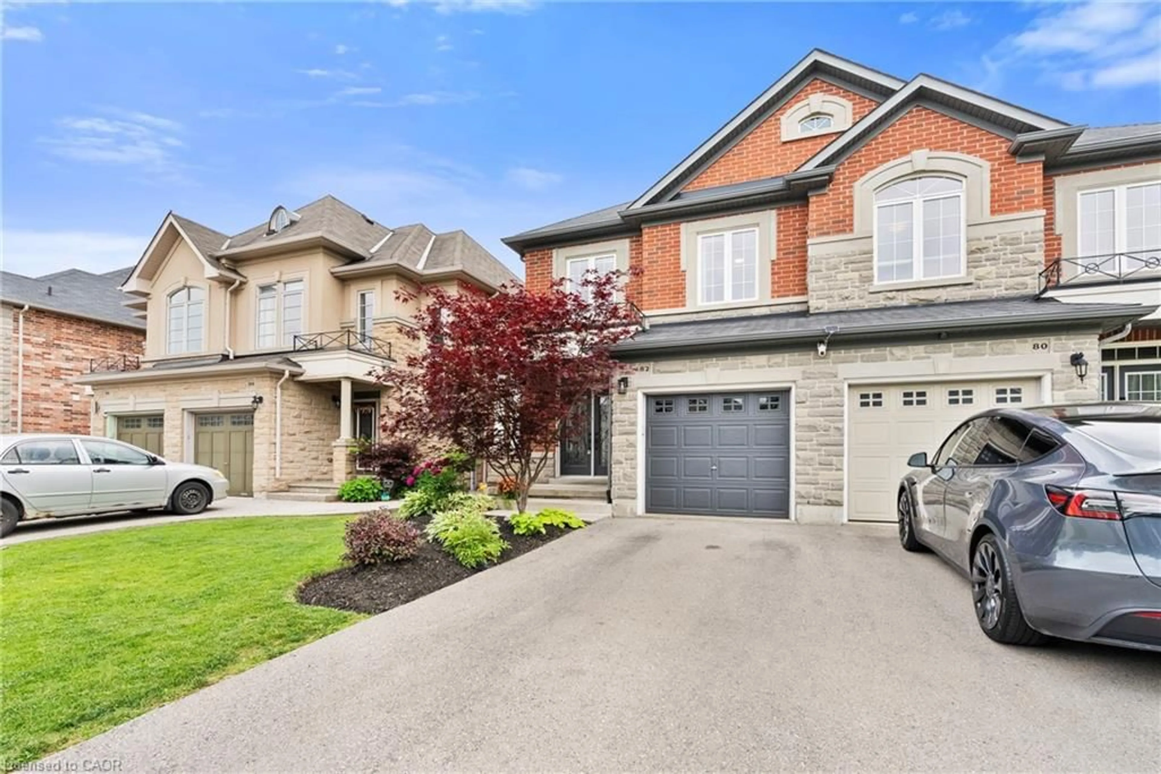 Home with brick exterior material, street for 82 Summerberry Way, Hamilton Ontario L9B 0G1