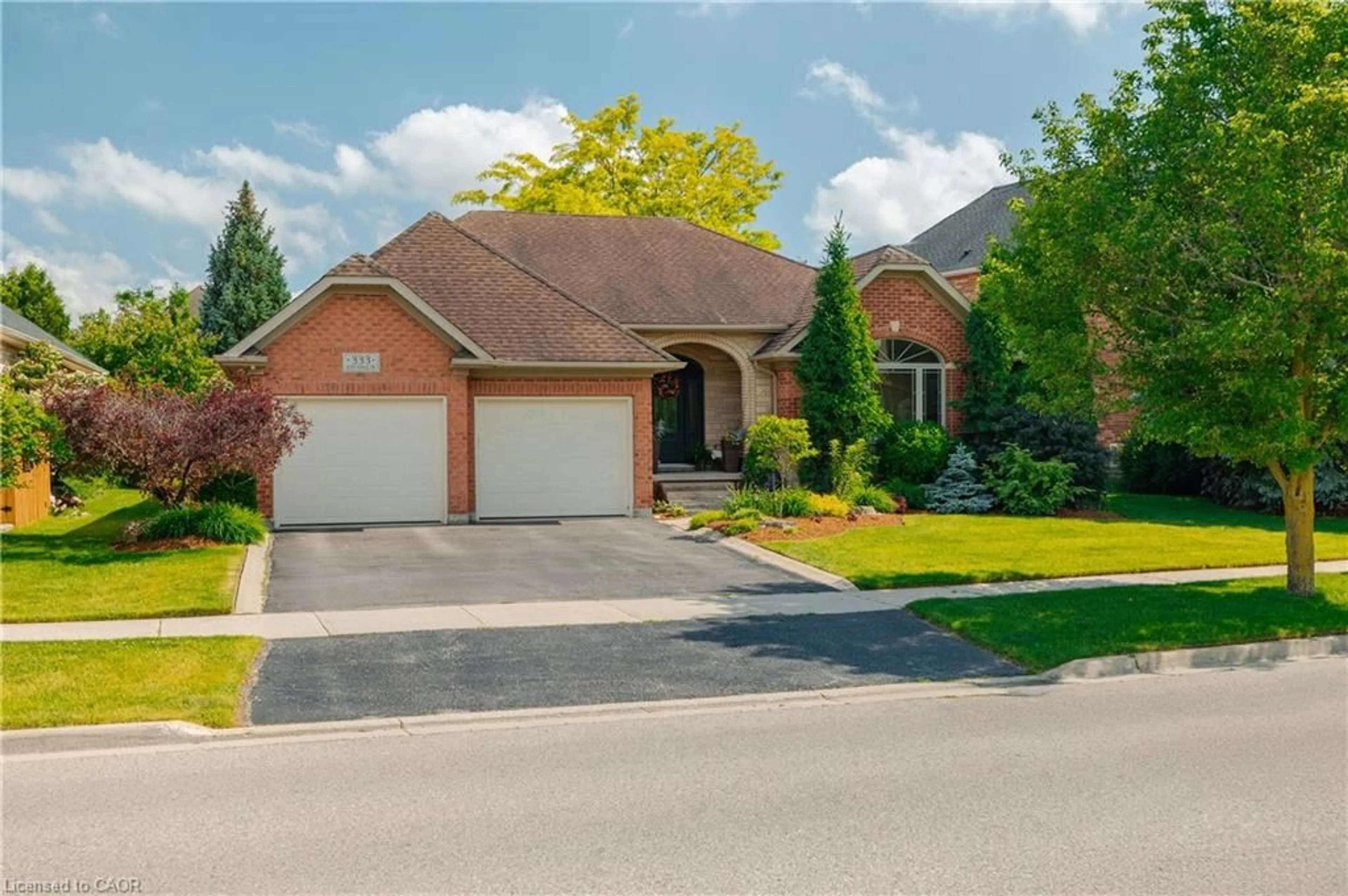 Home with brick exterior material, street for 333 Deer Ridge Dr, Kitchener Ontario N2P 2K6